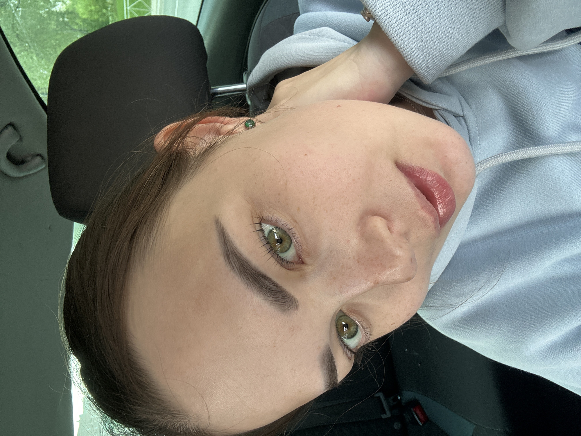 Woman takes late-night car selfies in Perm, Russia