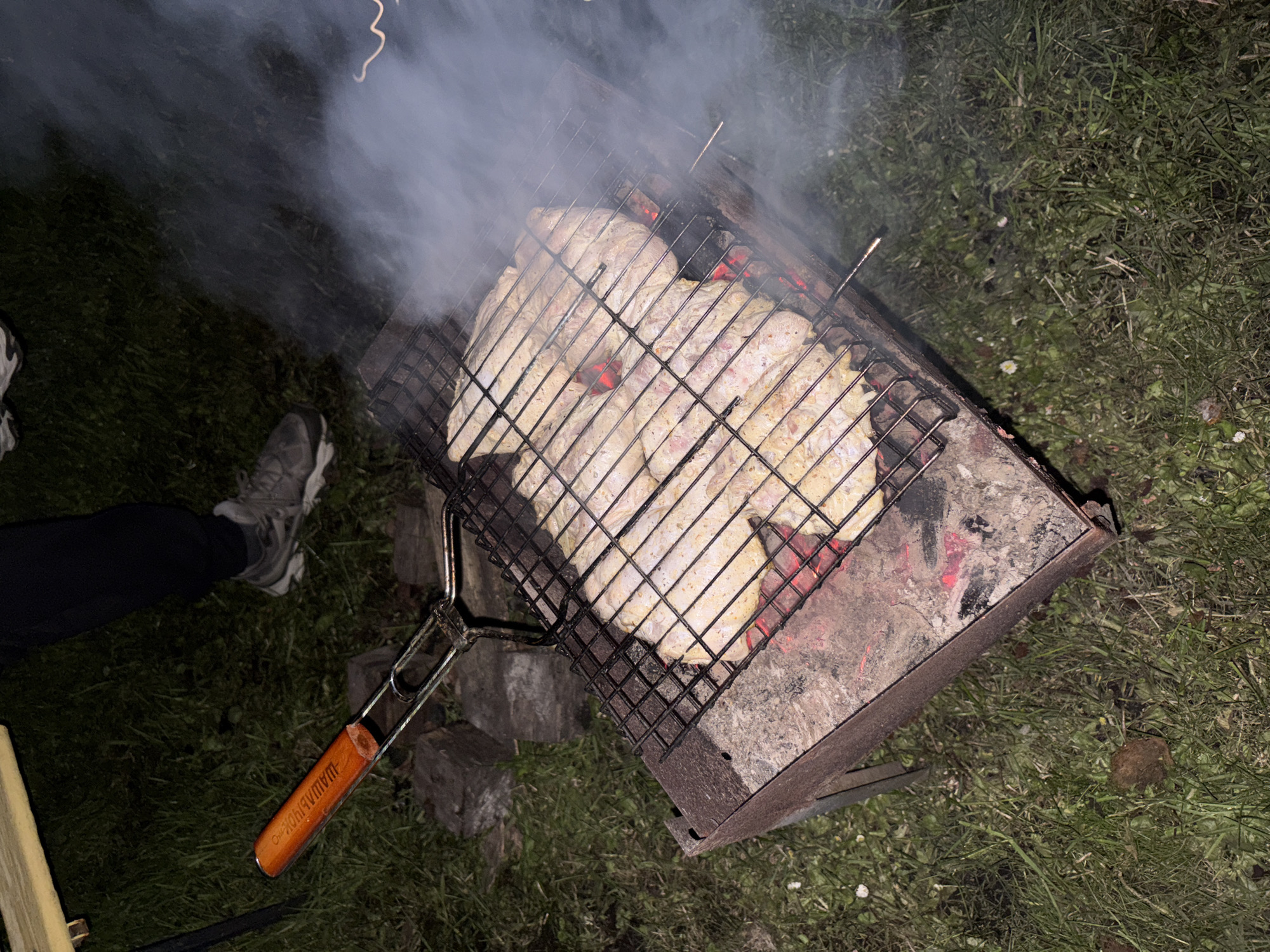 Nighttime barbecue gathering documented in rural Belarus village