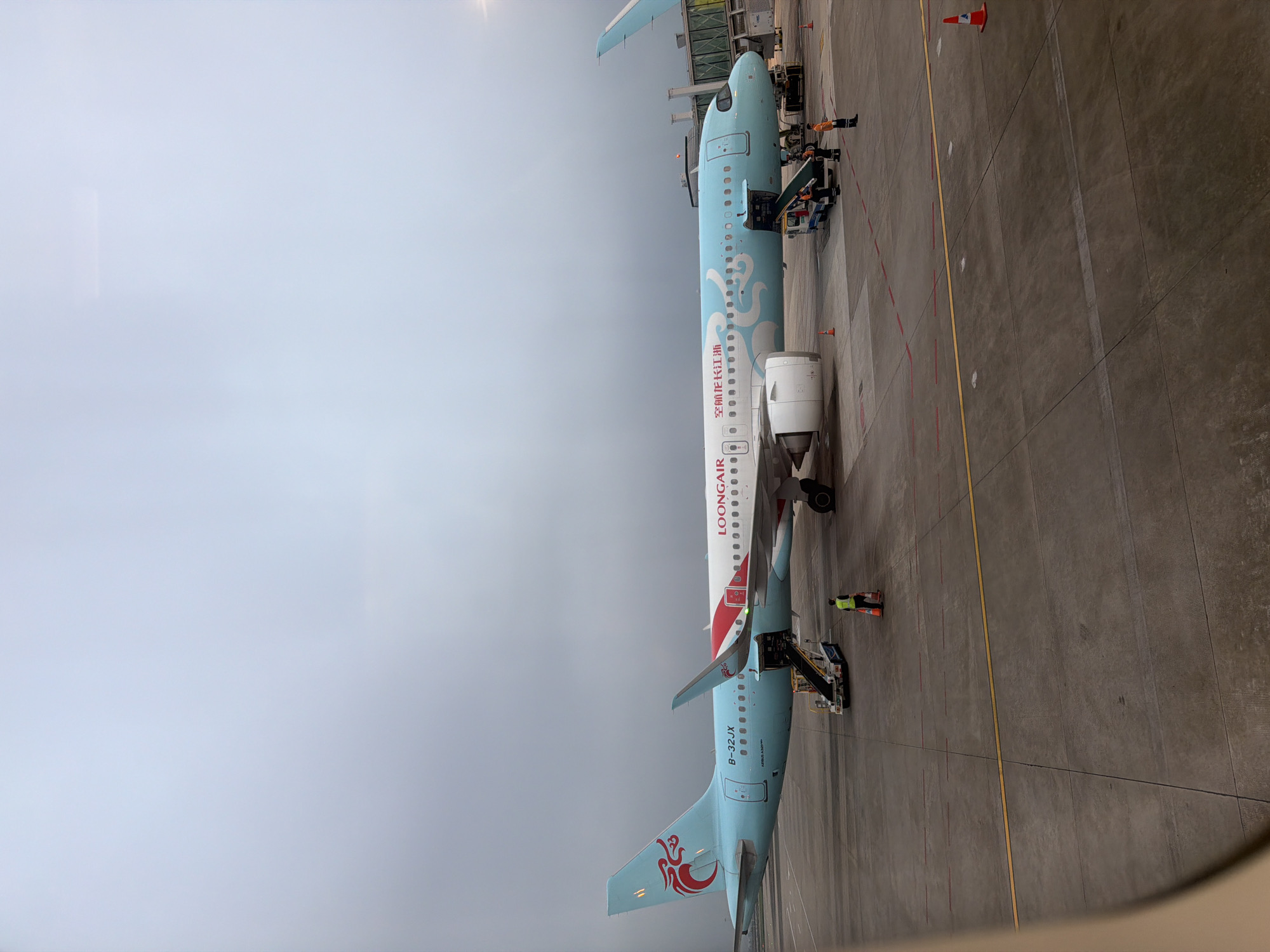 Evening flight operations documented at Guangzhou Baiyun International Airport