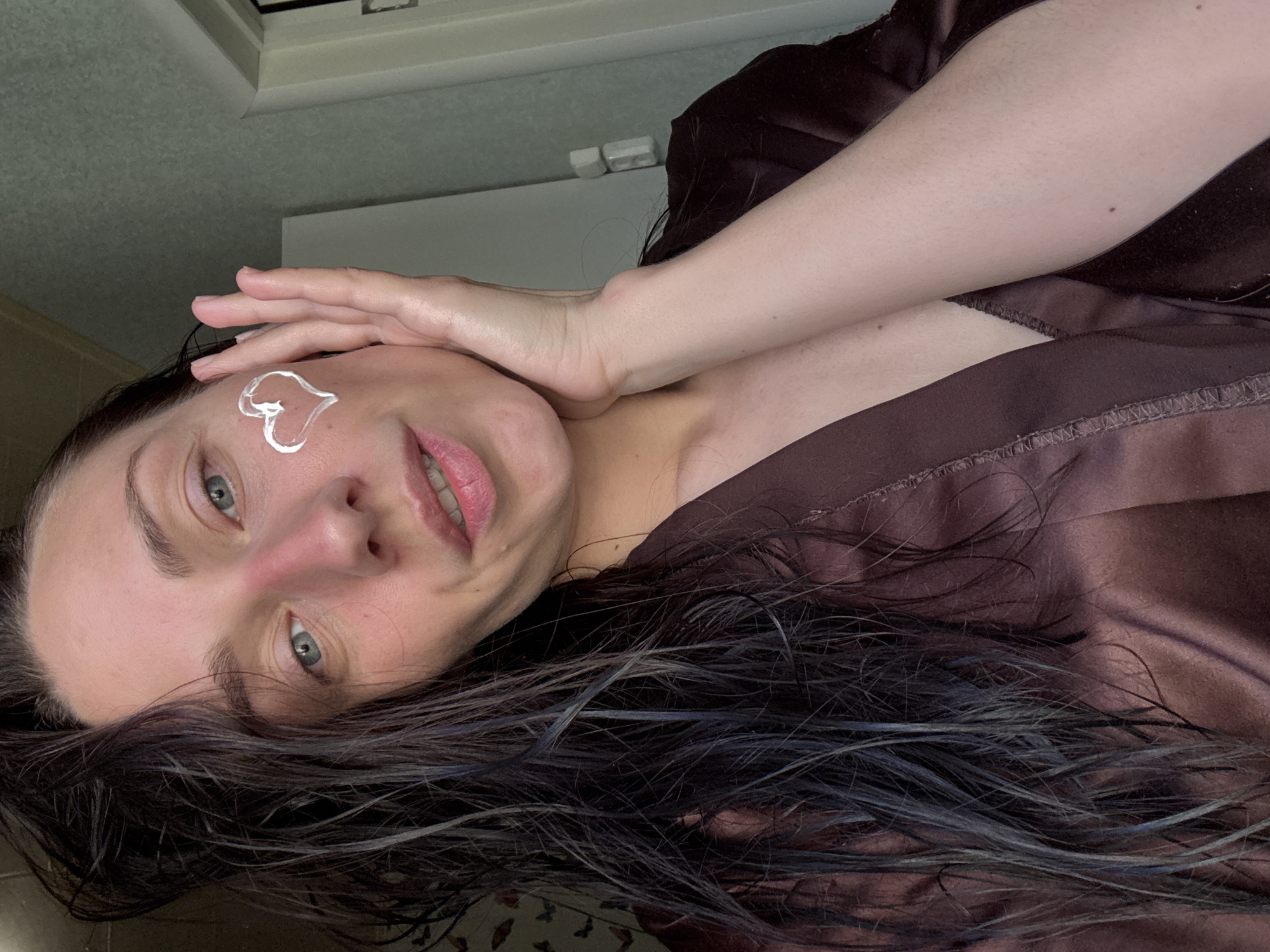 Skincare routine and cat playtime recorded in Saint Petersburg bedroom