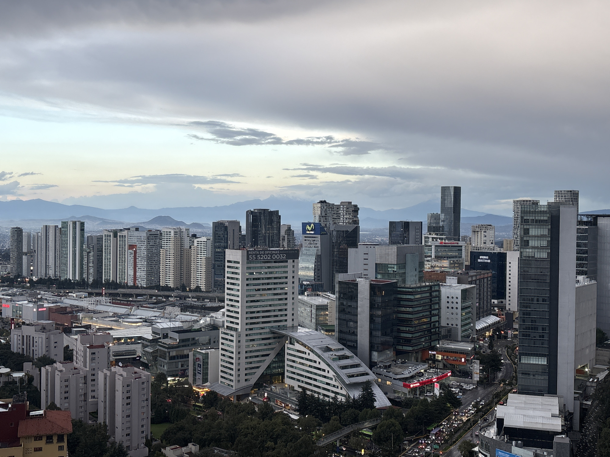 Mexico City's Santa Fe skyline under cloudy skies