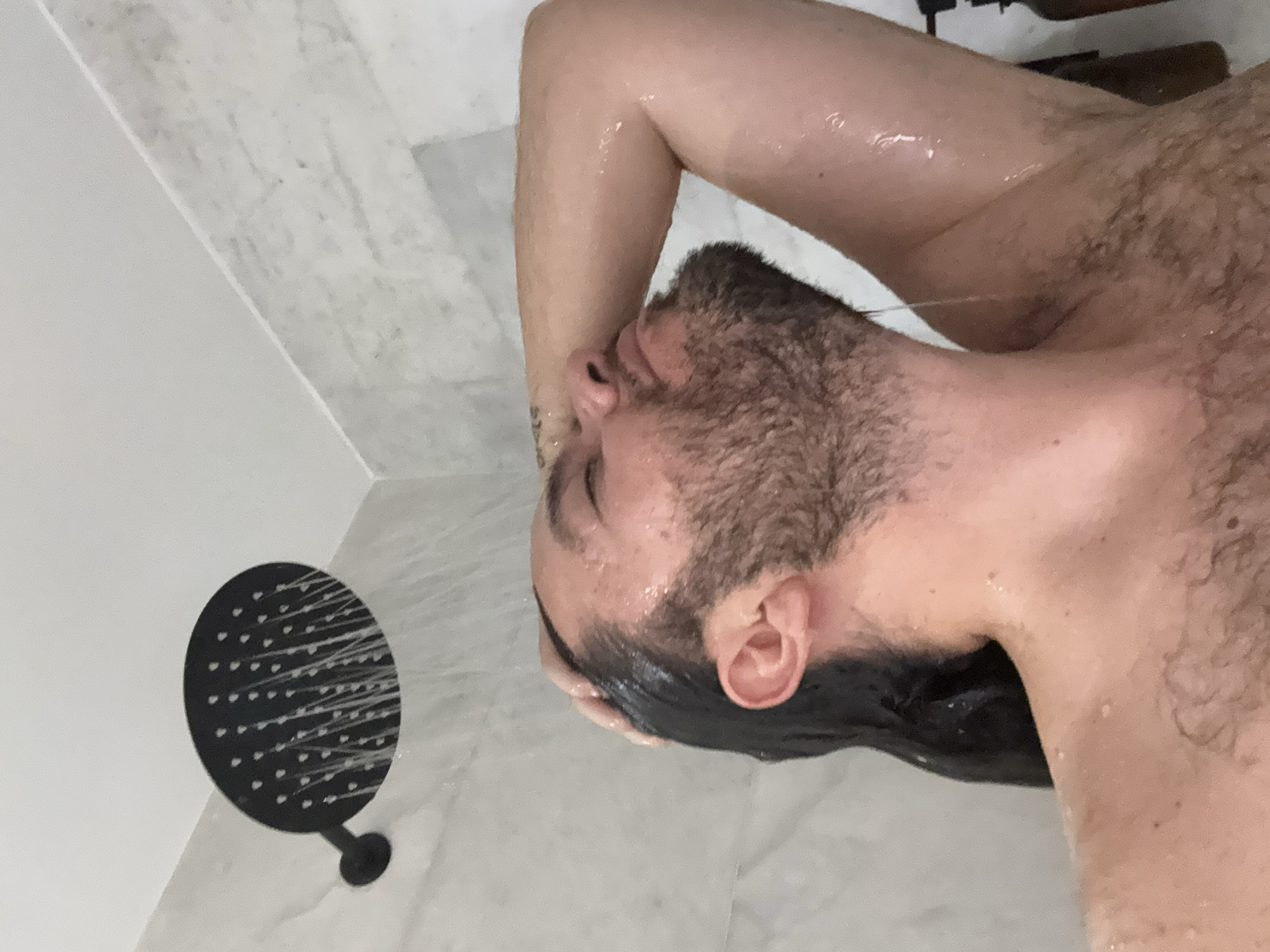 Man's morning bathroom routine documented in Mexico City apartment
