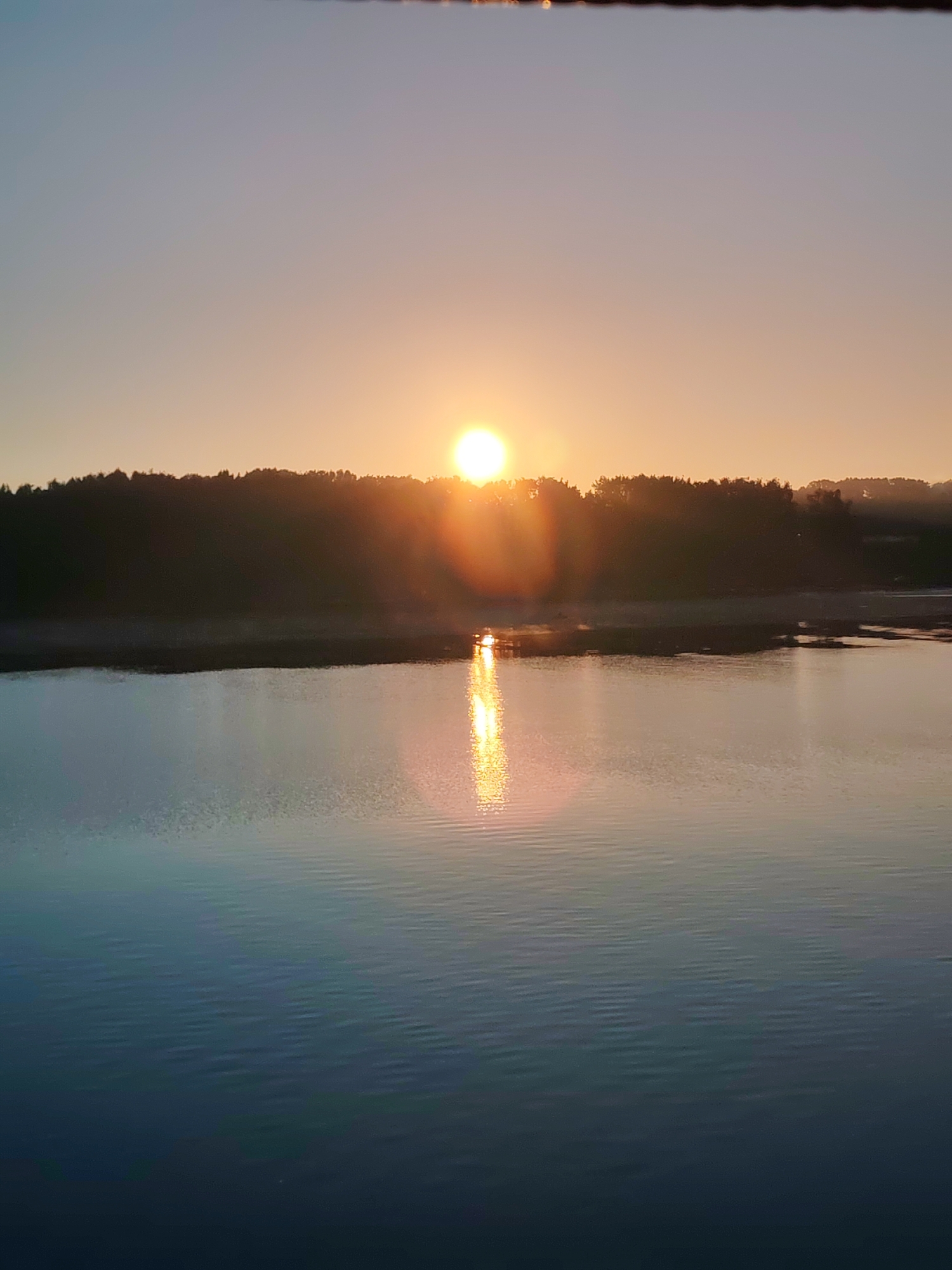 Late-night summer light at a Russian river port