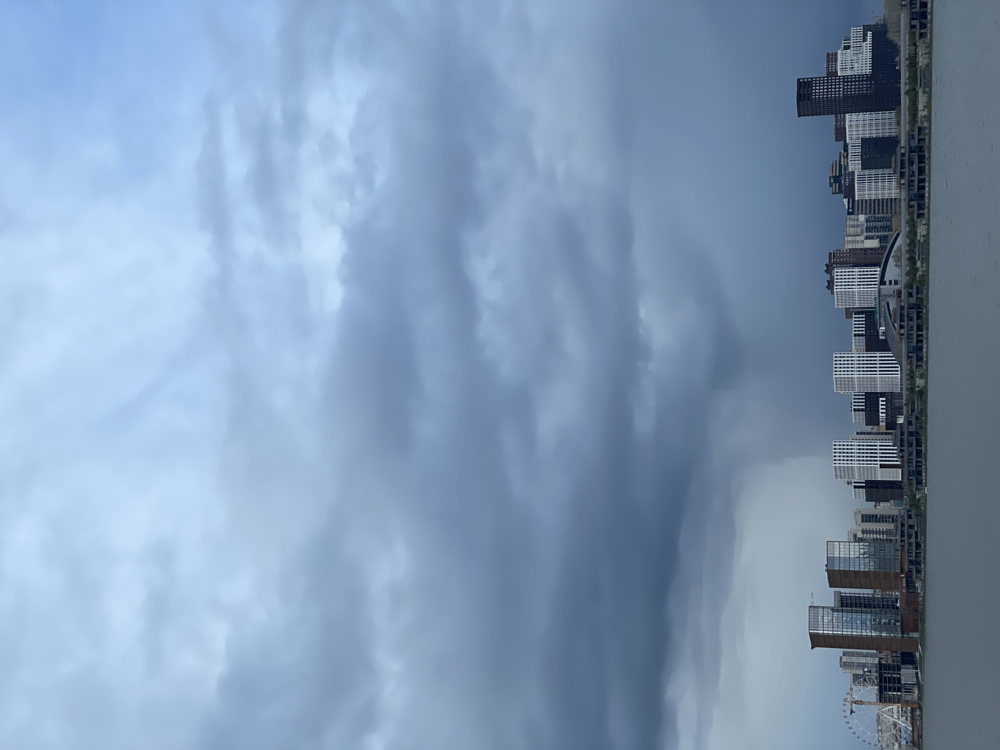 Modern waterfront architecture documented under overcast April skies