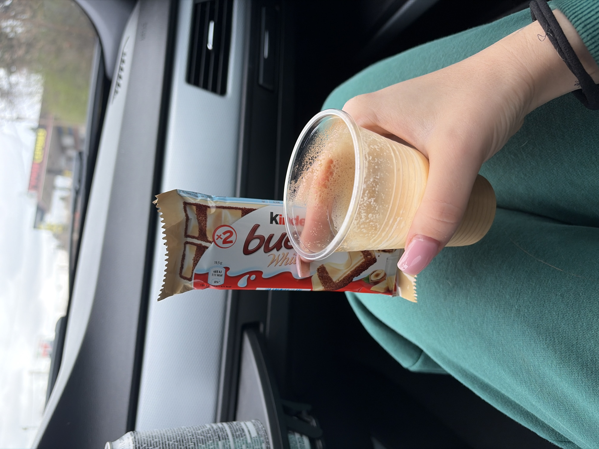 Car snack break with chocolate and coffee in Sofia