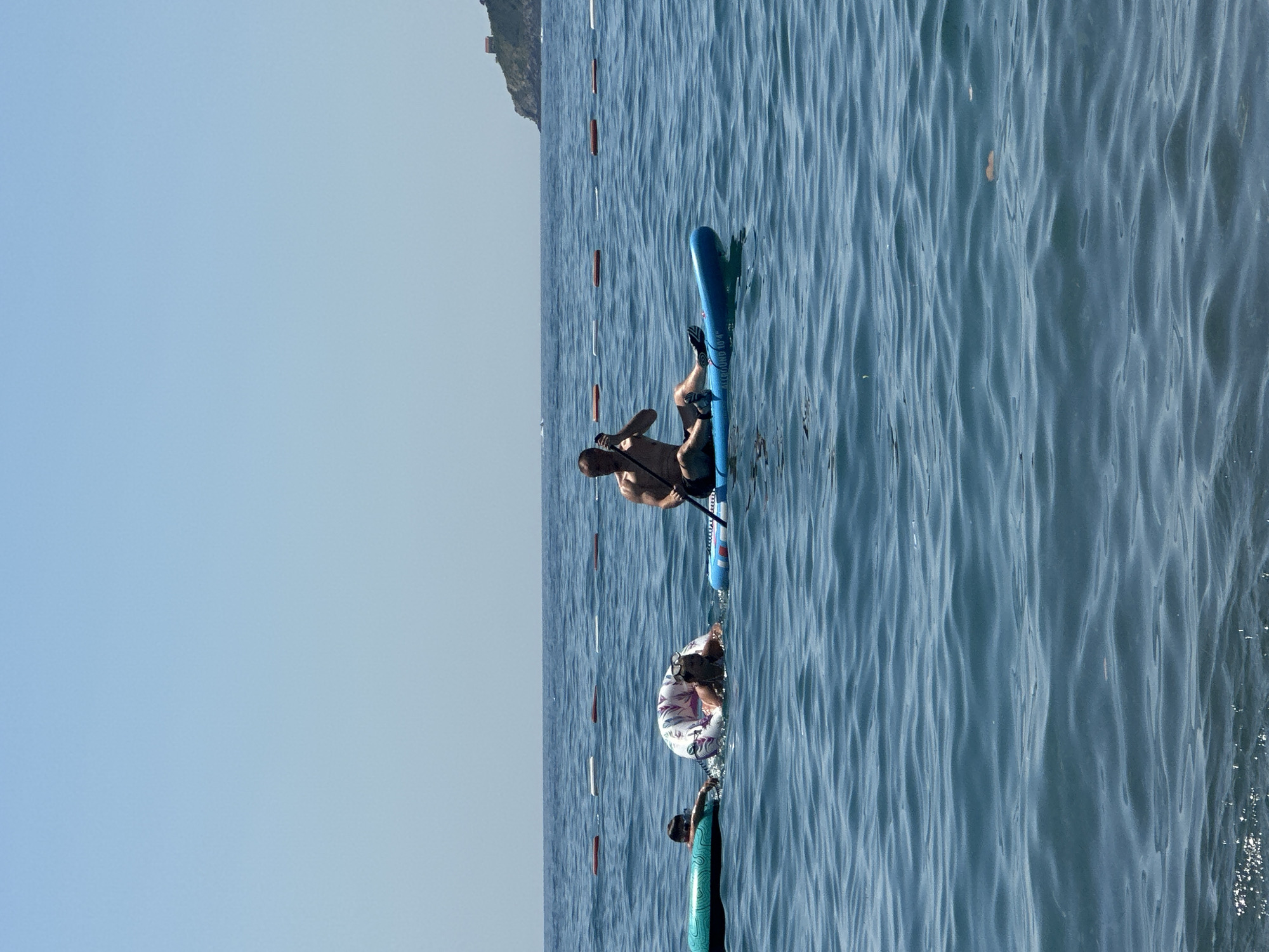 Parasailing and watersports fill a sunny Boreti morning