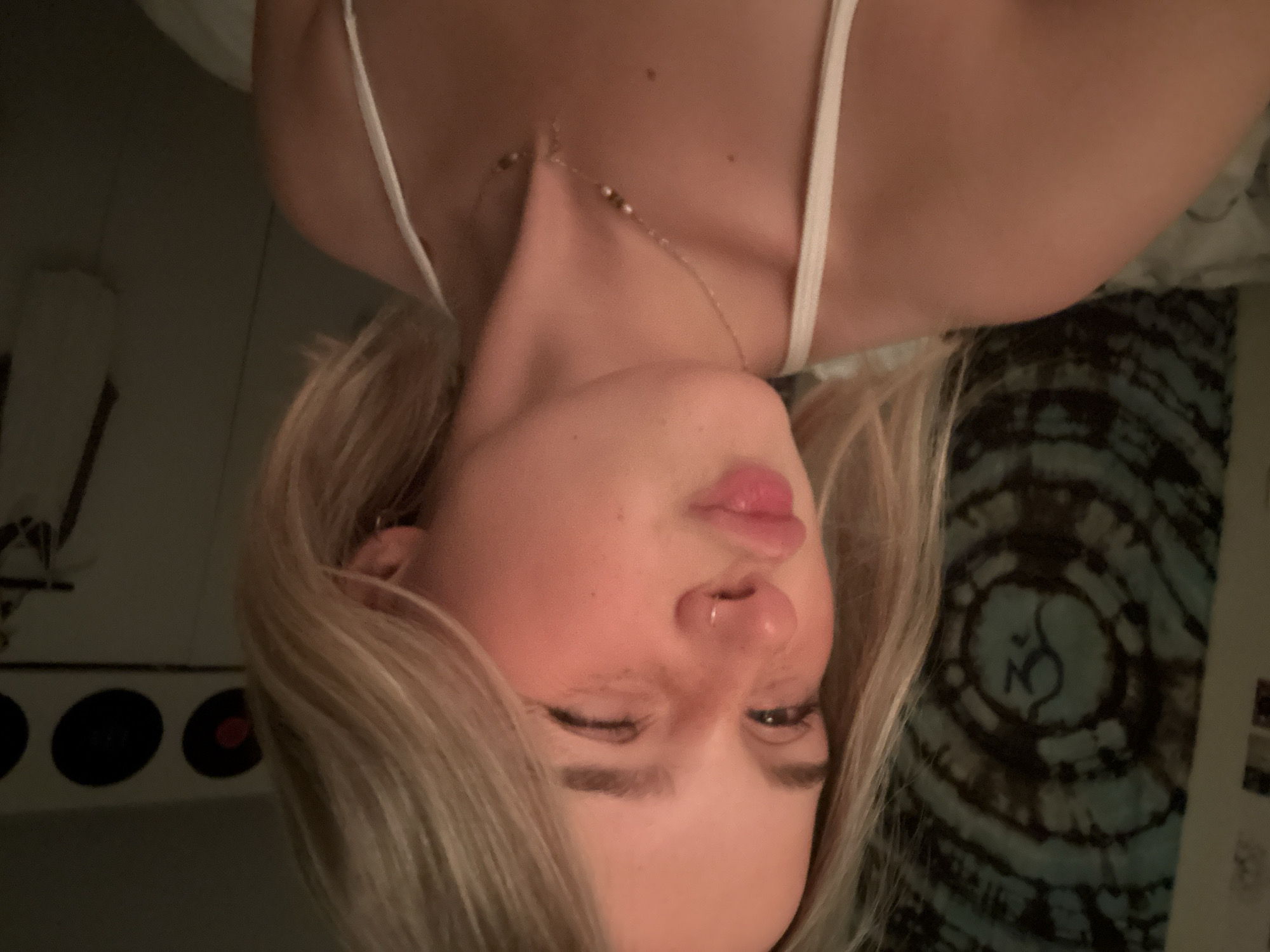 Woman takes morning selfies in Whistler room