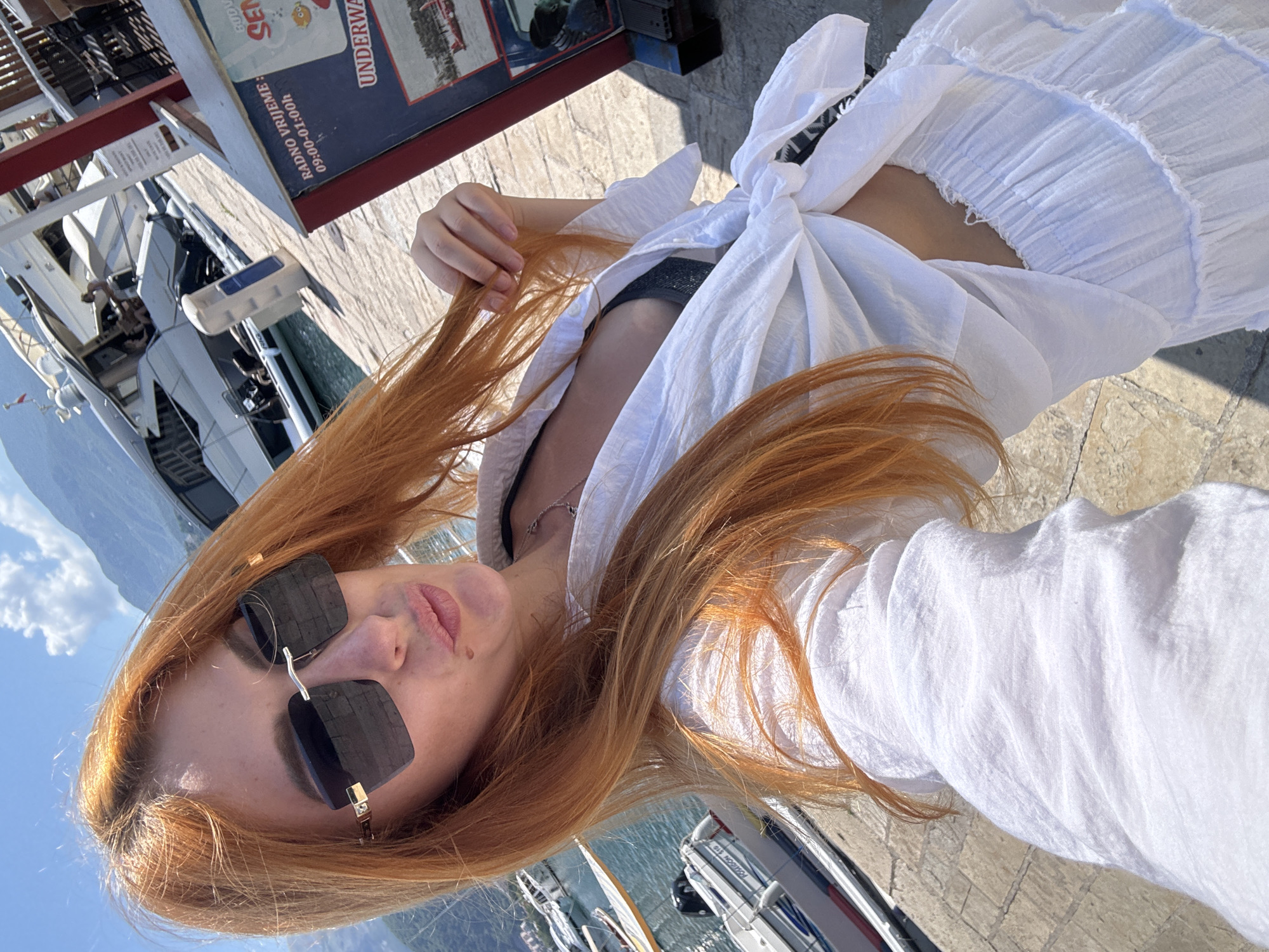 Tourist documents morning visit to Budva marina and monuments