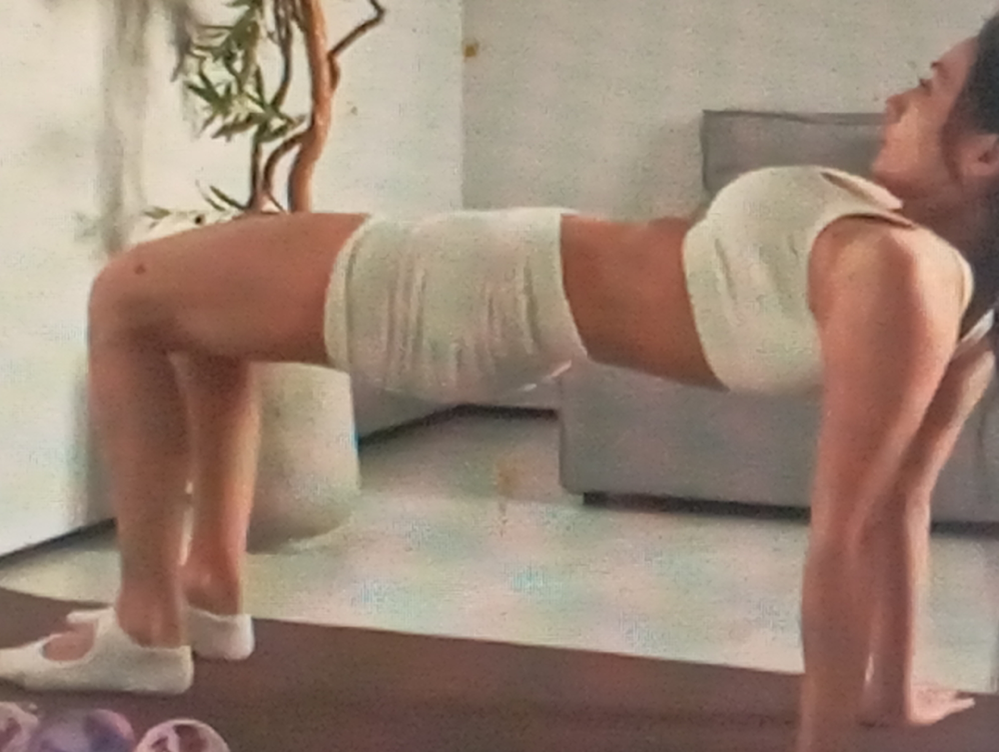 Home workout session with yoga and flexibility moves in Ukraine