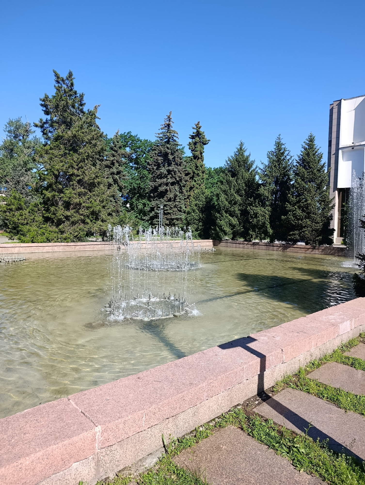Rainbow fountain display observed near Denis Ten statue in Almaty