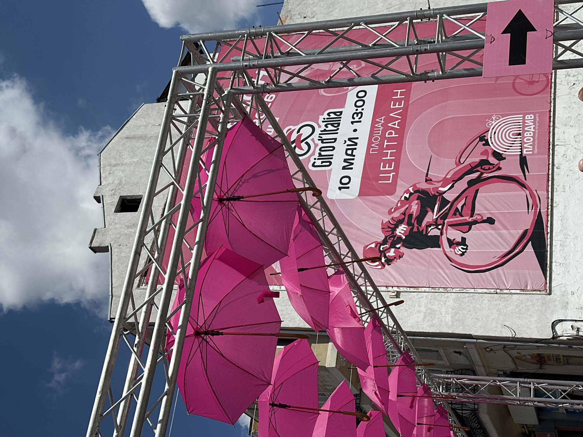 Traditional bagpipe parade marches through Giro d'Italia decorated Plovdiv streets