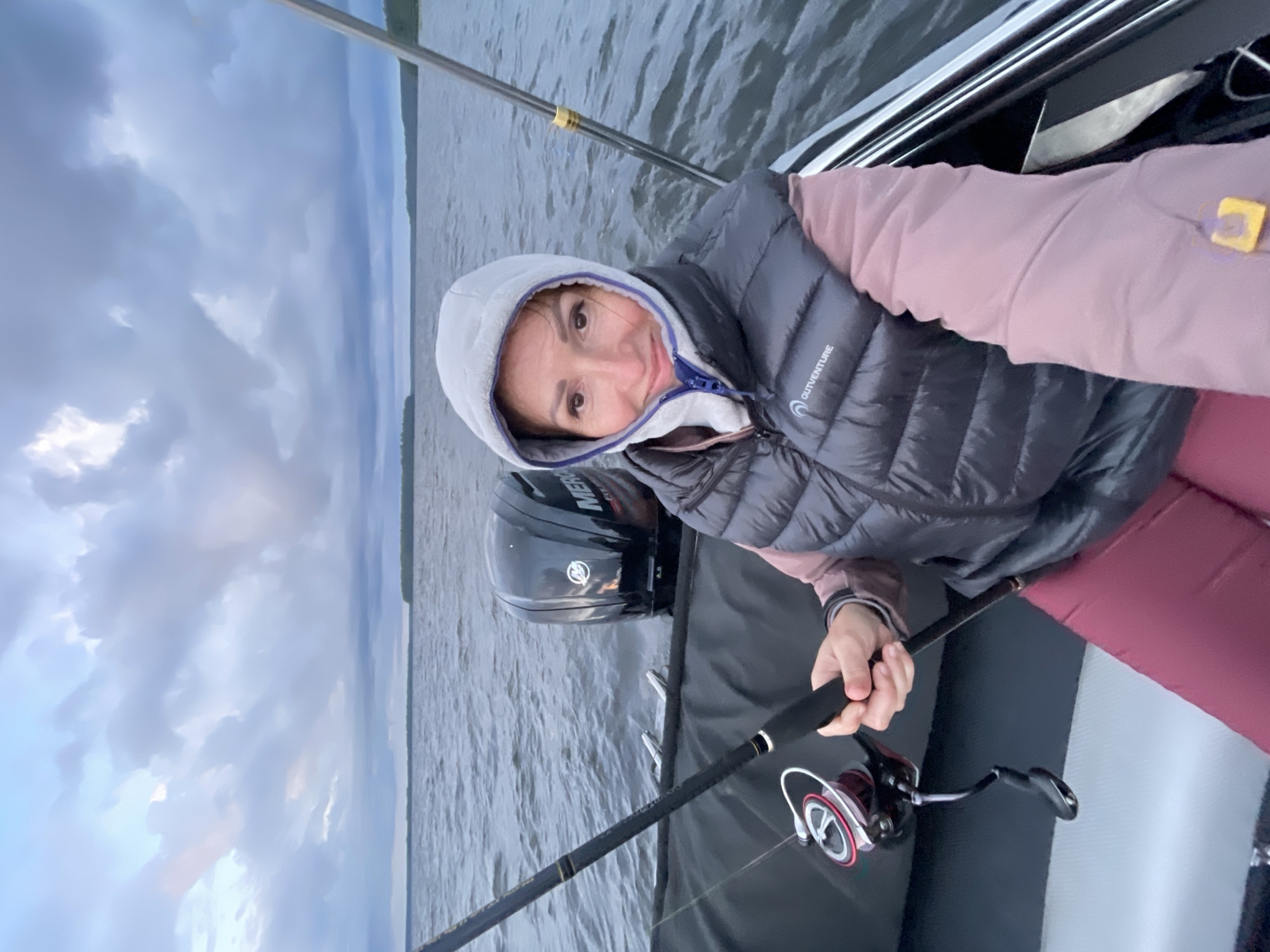Fishing trip on a grey, choppy lake near Tsvetkovo