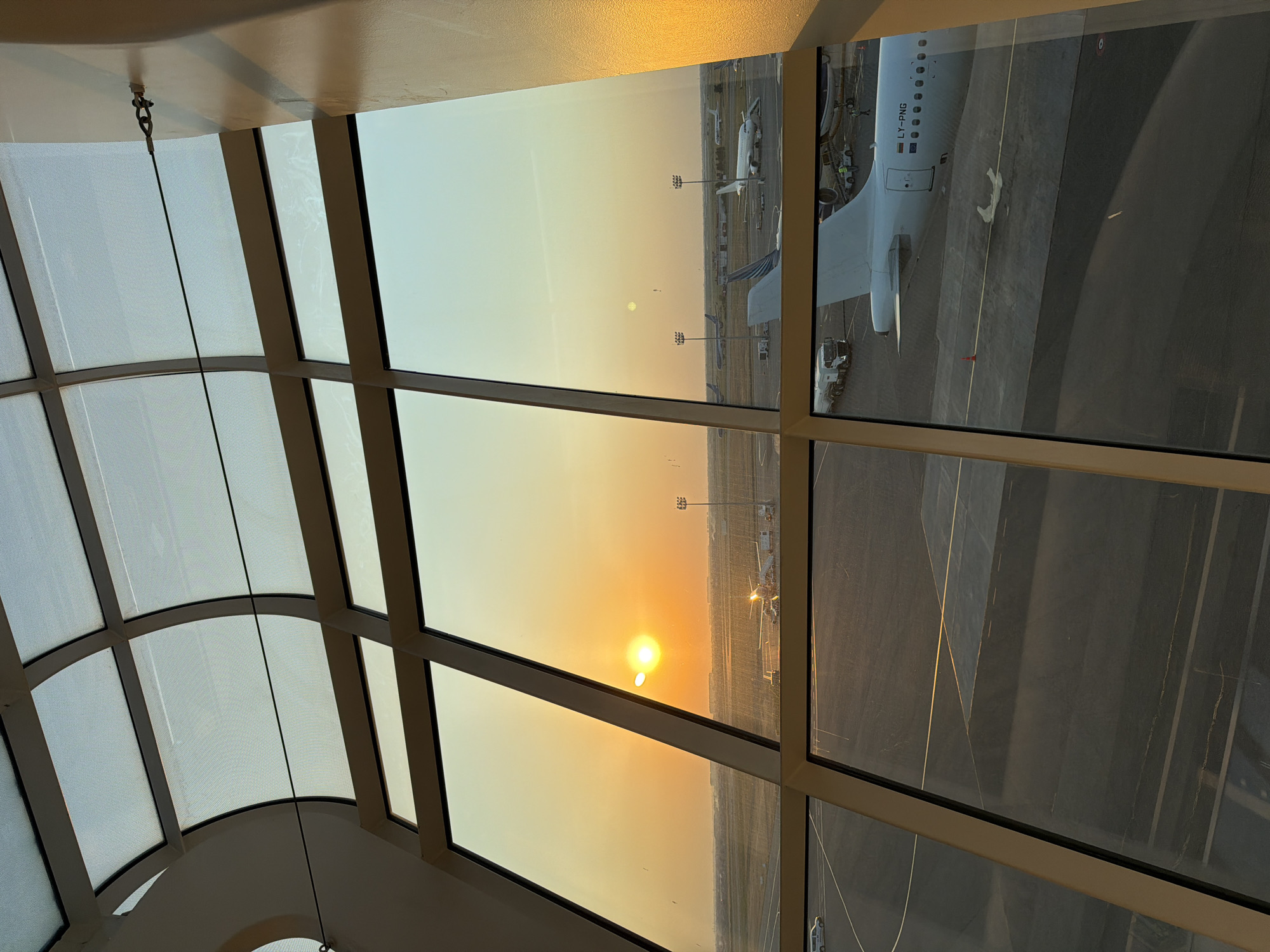 Inside Baku's airport terminal at sunset, July 2026