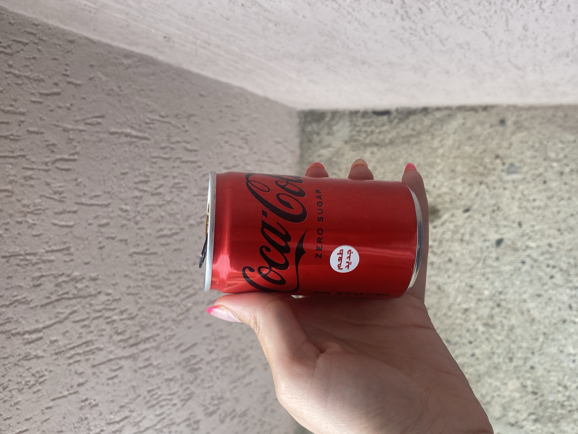 Person holds Coca-Cola Zero Sugar can in Sliven, Bulgaria