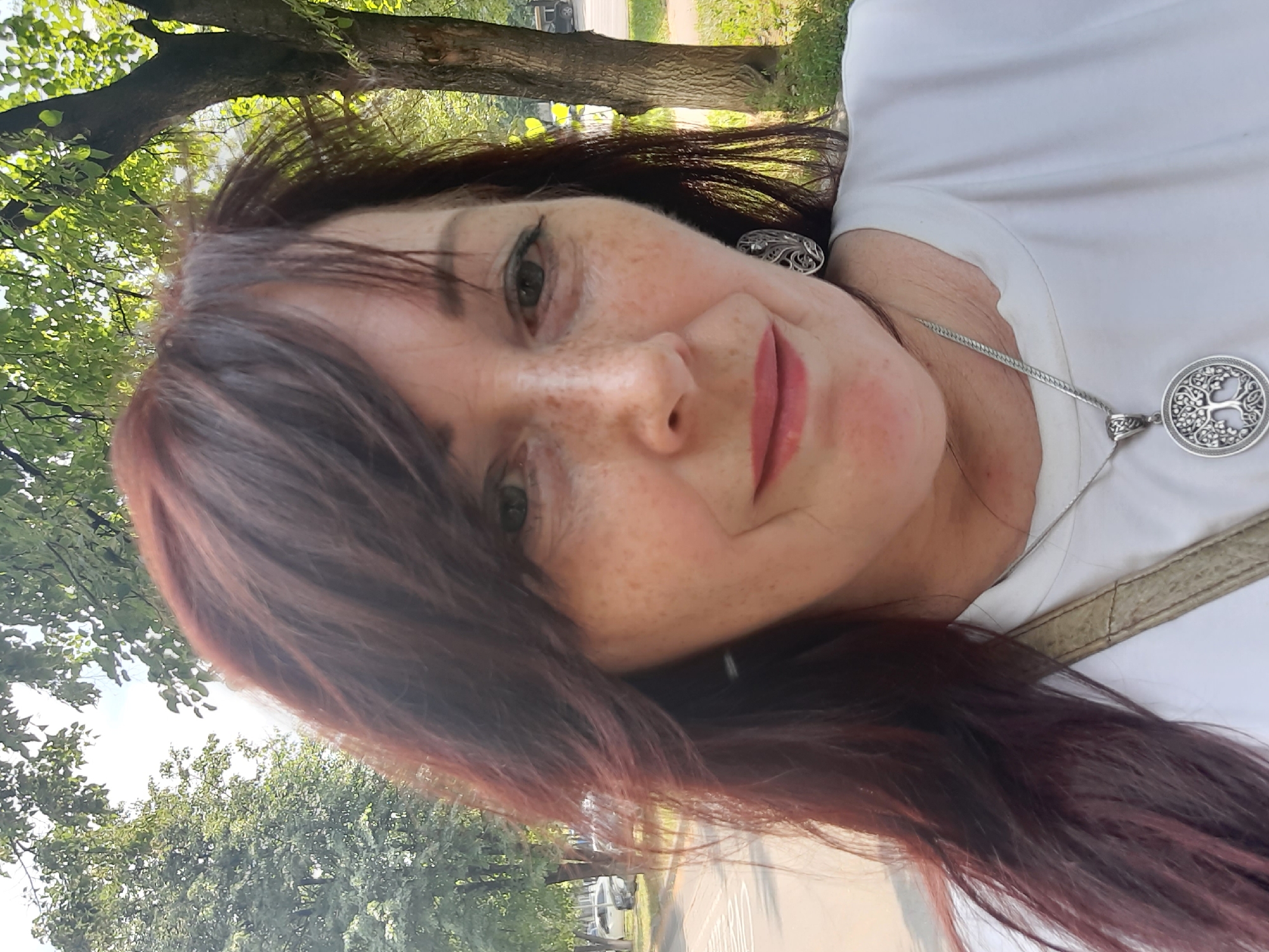 Casual portrait in a Kemerovo park on a summer morning