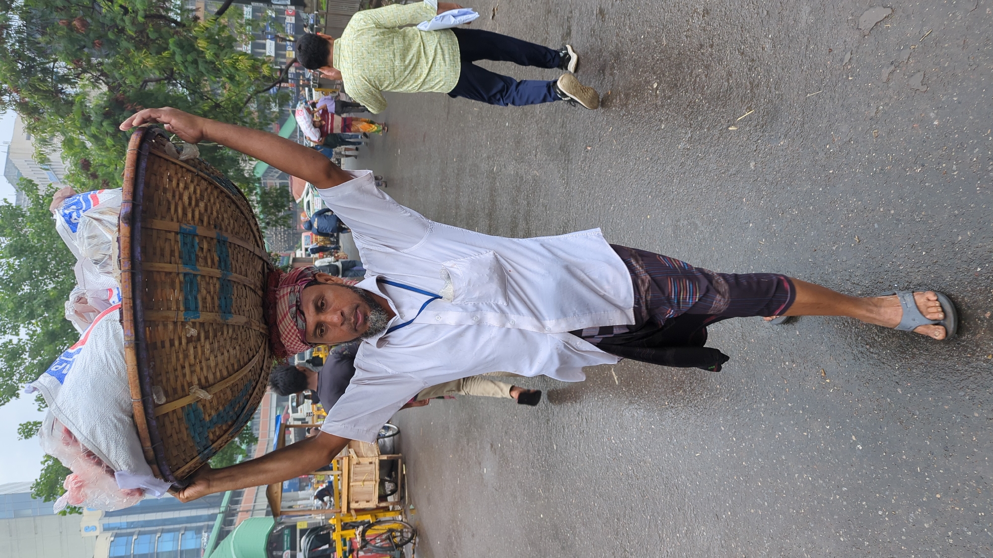 Early morning street food vendors operate in Dhaka