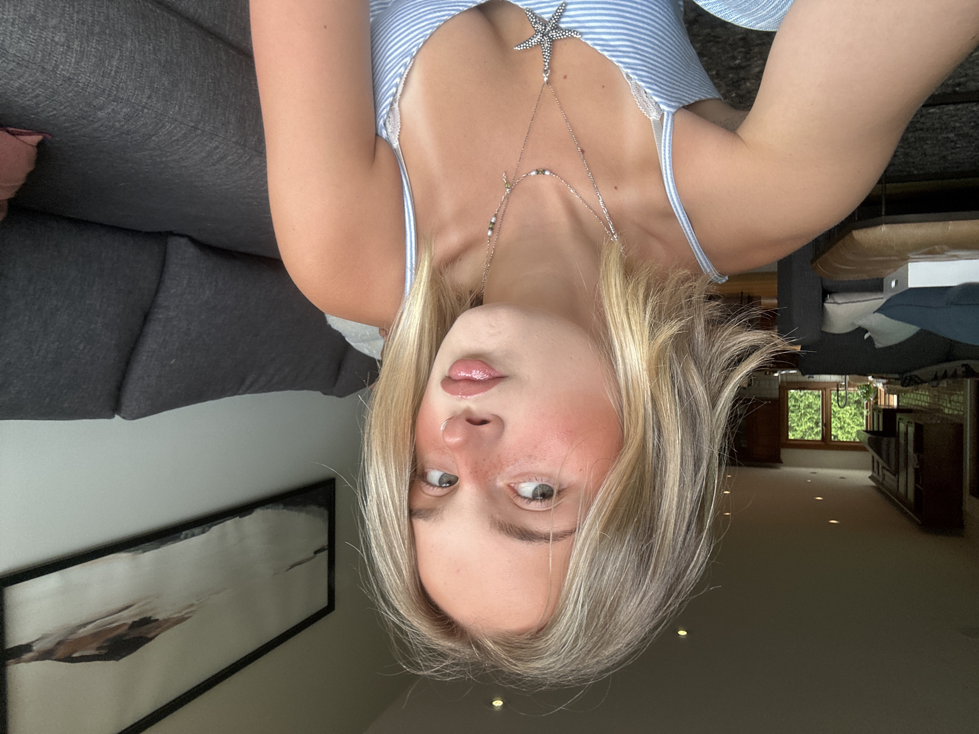 Woman takes selfies with dog in Squamish home
