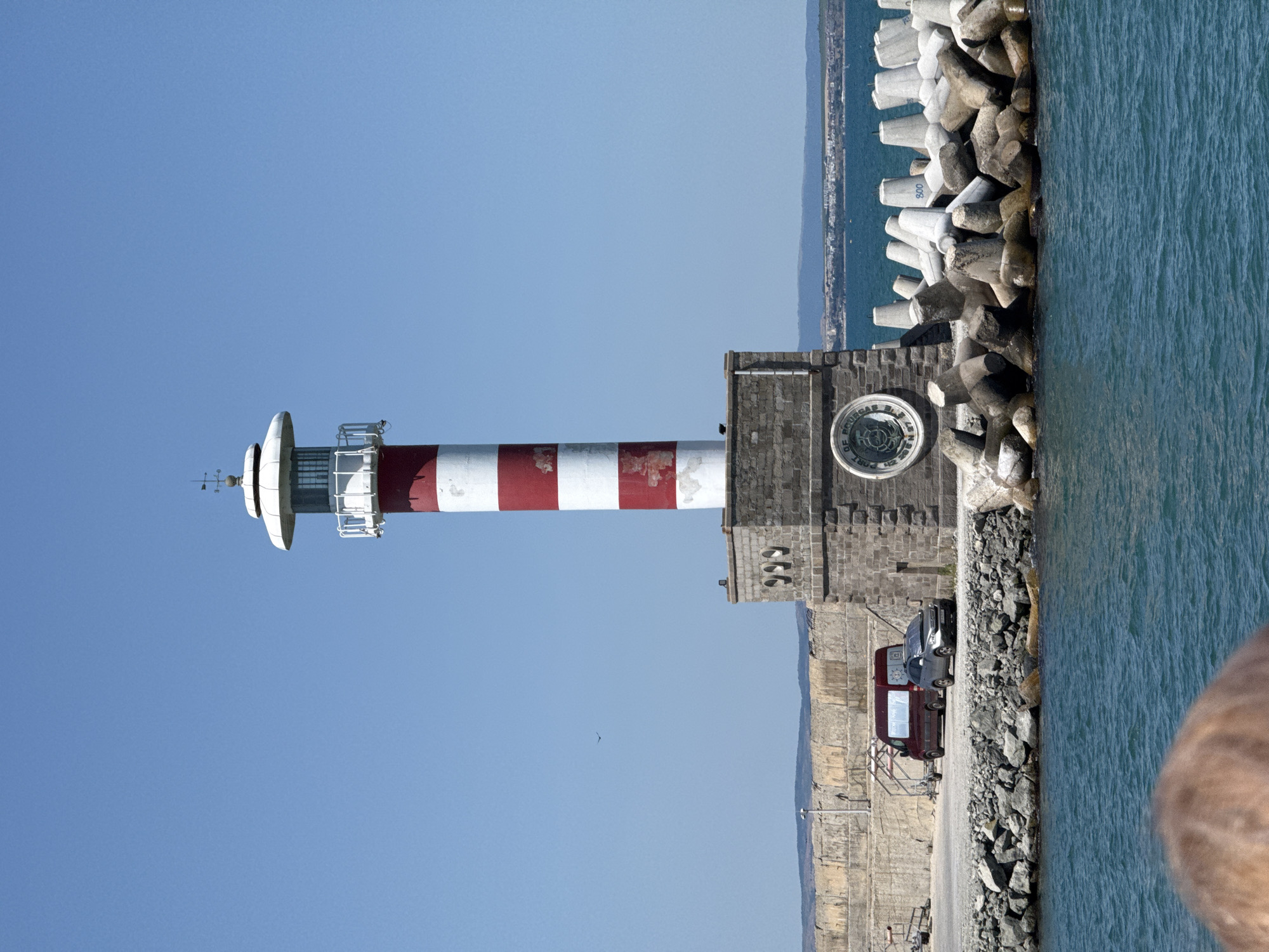 Port of Burgas lighthouse and harbor, seen from land and sea