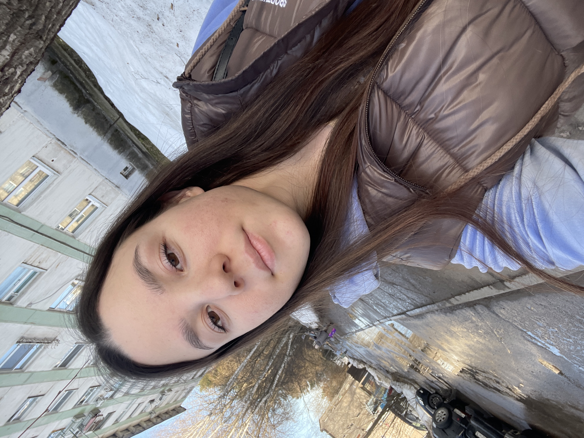 Women take selfies across snowy Chaikovsky, Russia streets