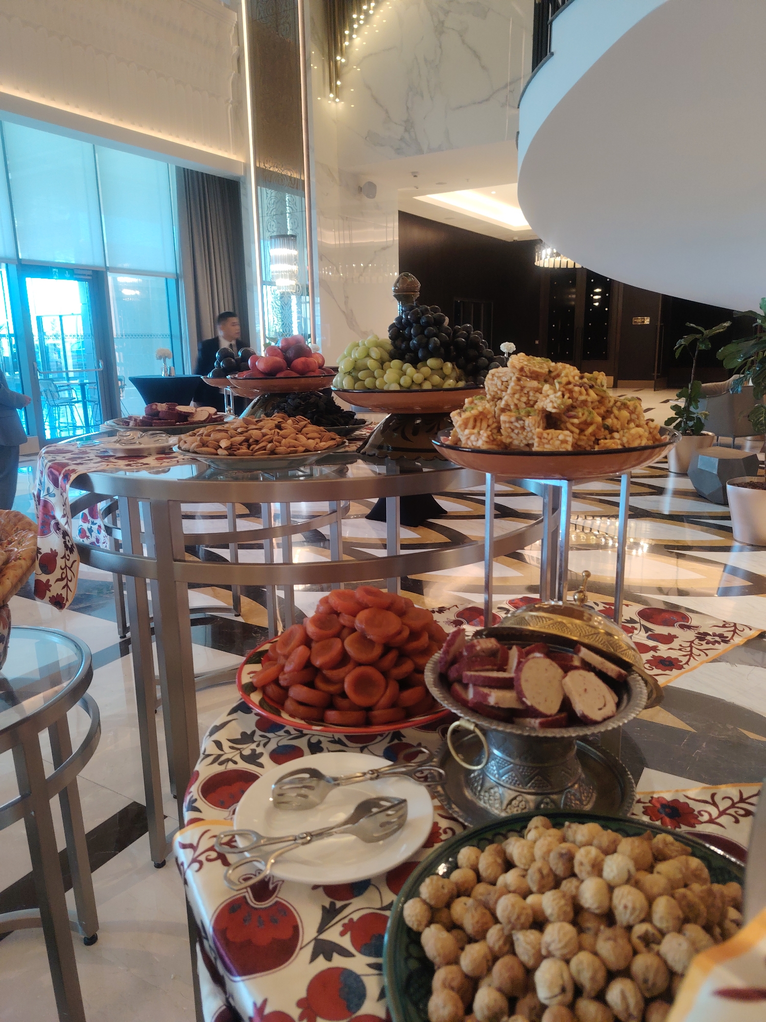 Inside a traditional Uzbek hotel in Konigil, food and crafts on display