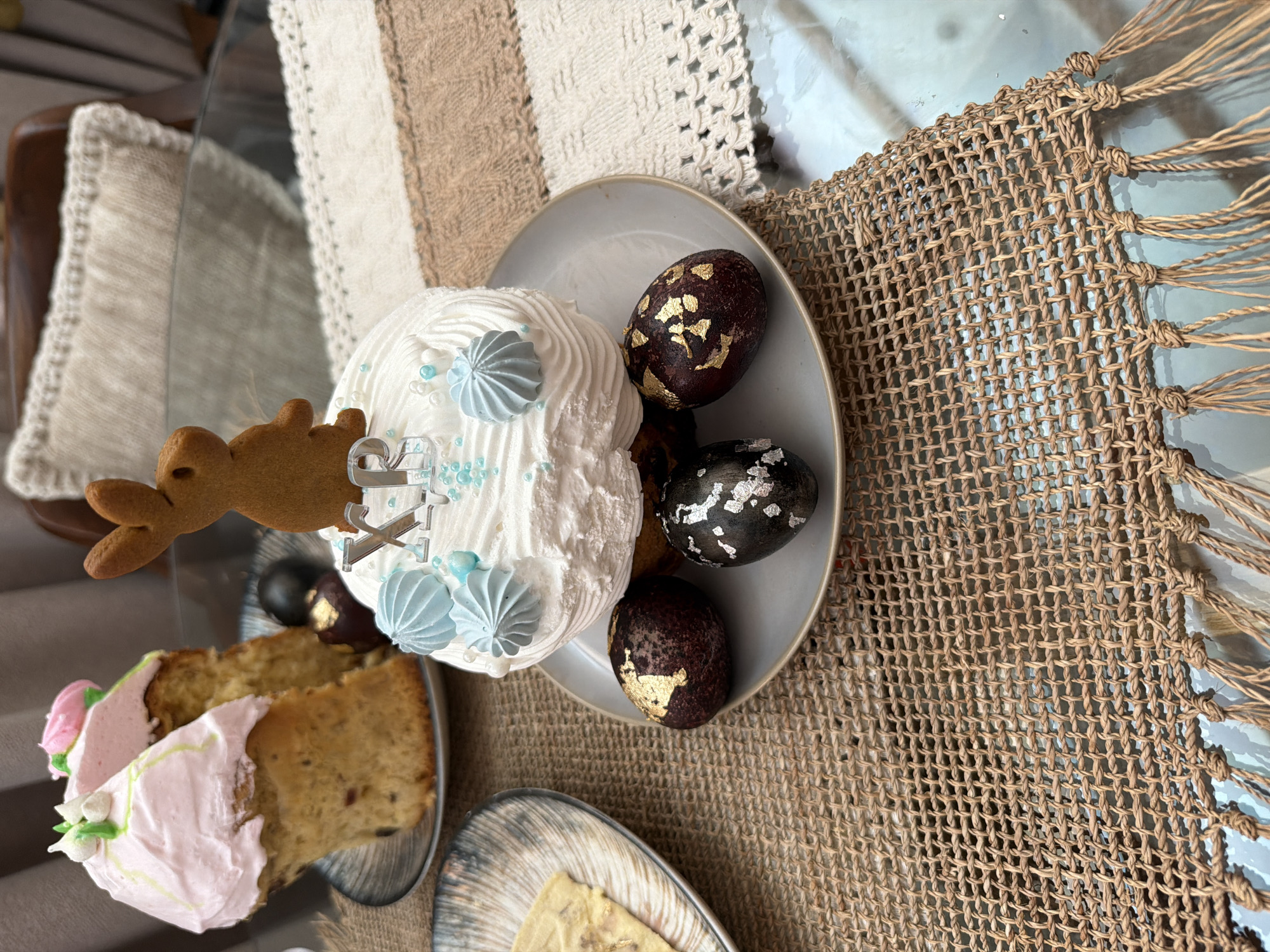 Early morning Easter celebration captured with decorated eggs and cake