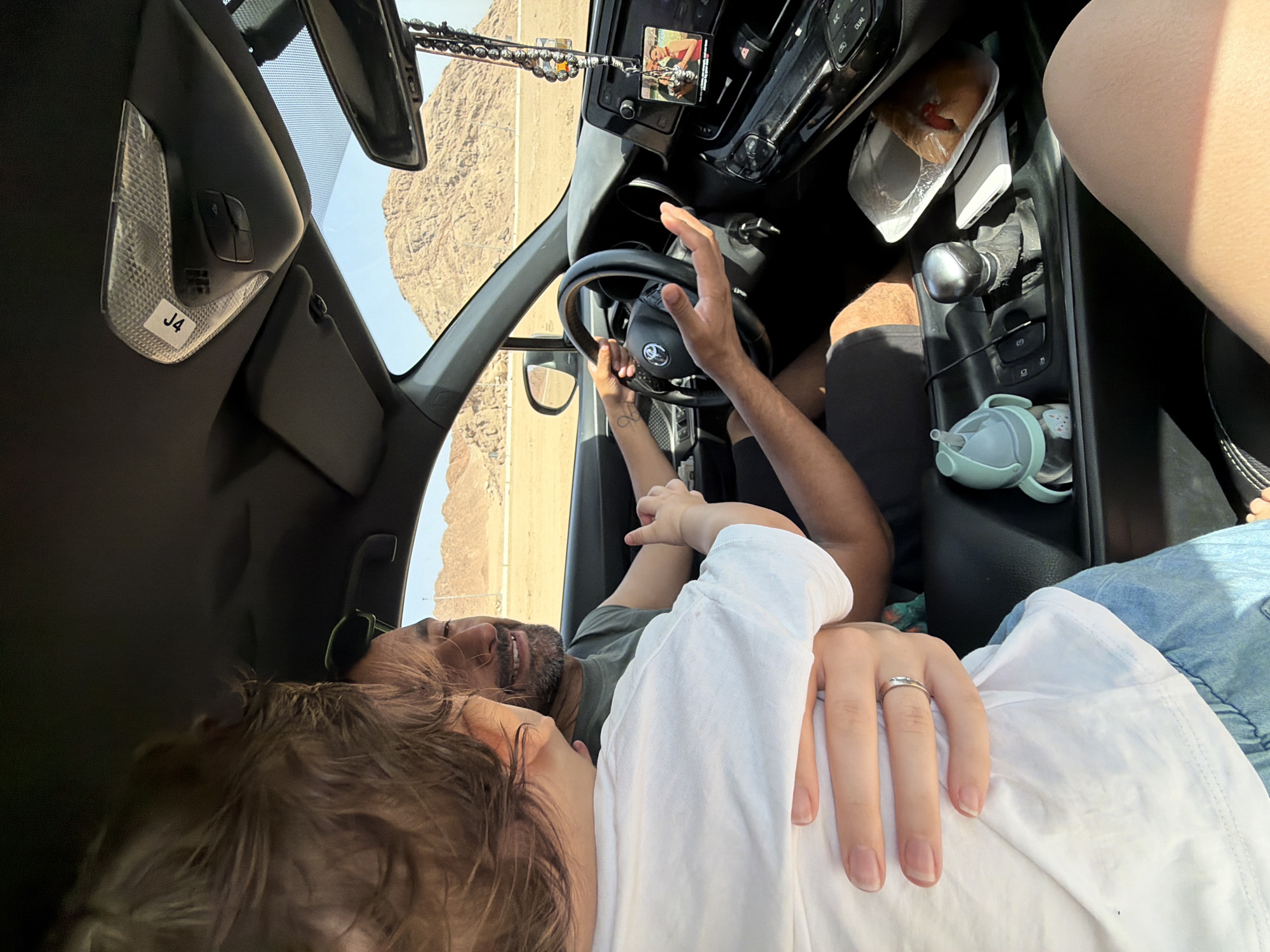 Car ride in Sharm El Sheikh with a toddler in the foreground