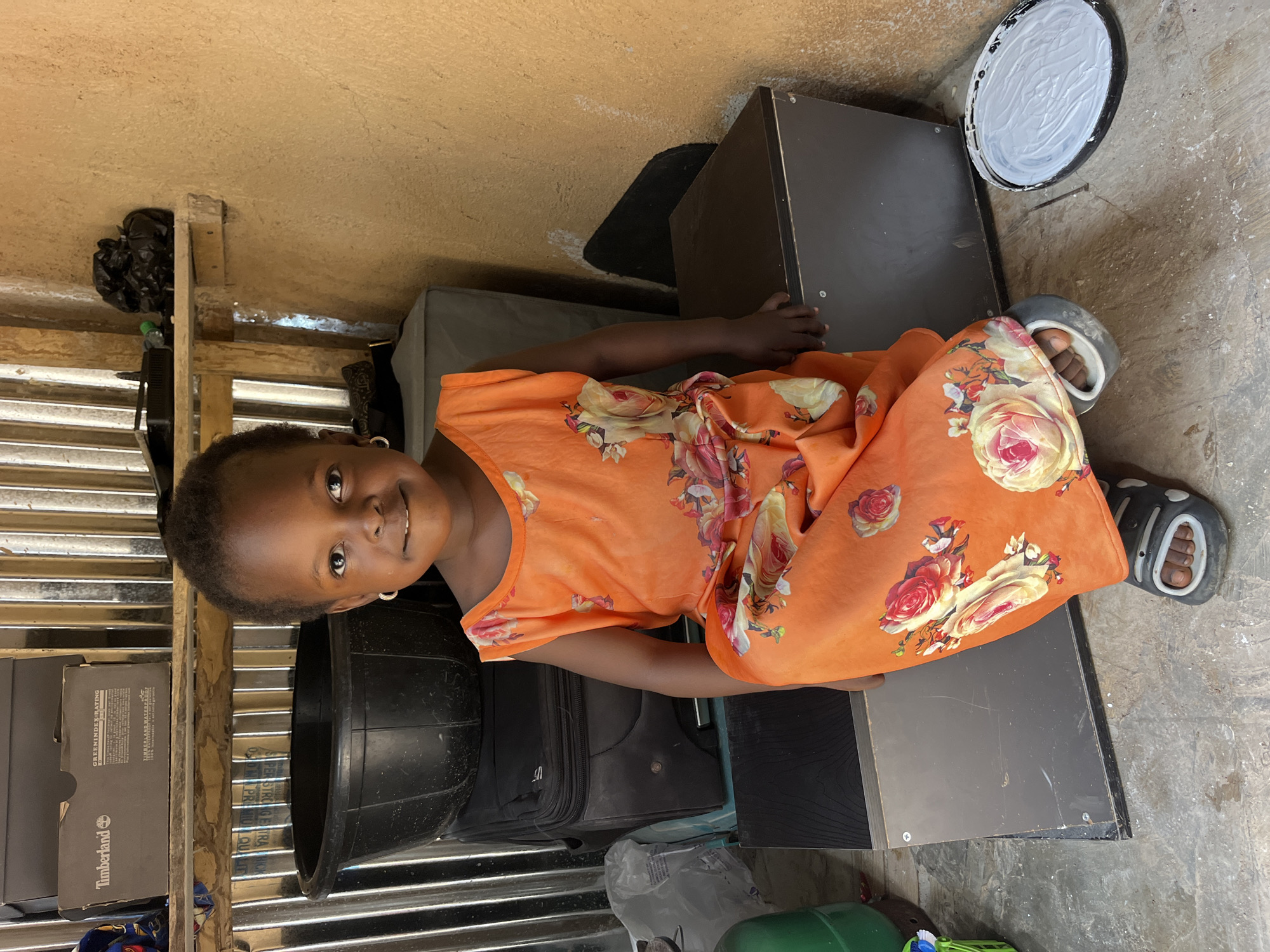 Everyday moments: kids, hair braiding, and a paint job