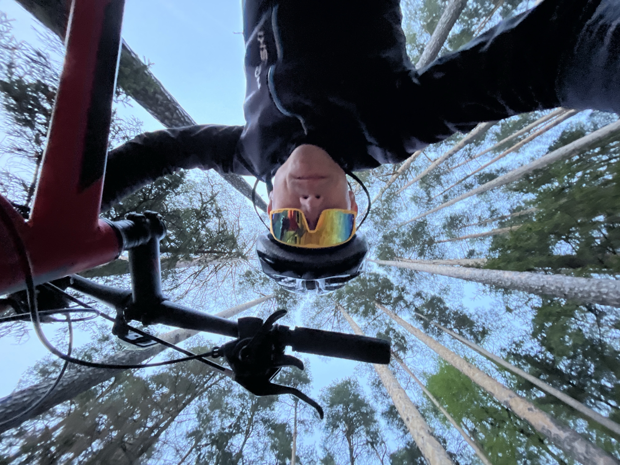 Mountain biker documents forest ride with creative selfies near Chaikovsky