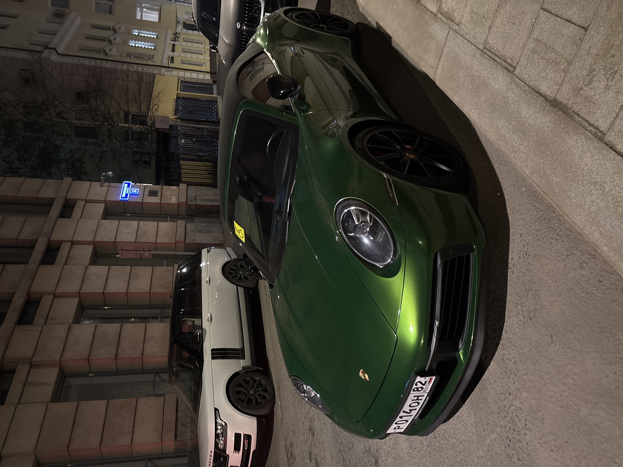 Green Porsche spotted on Moscow street at night