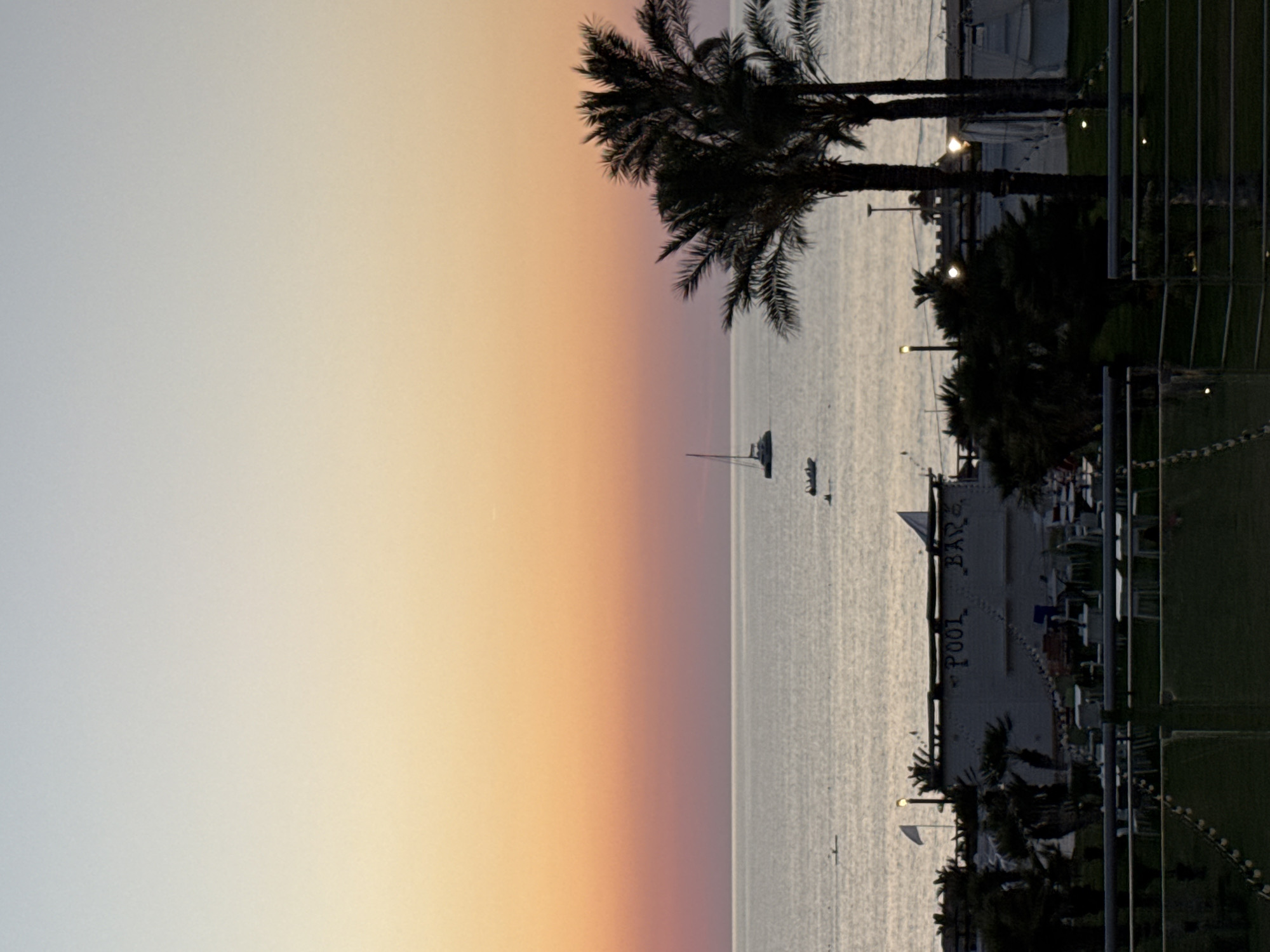 Sunset watch from a Sicilian coastal resort, July evening