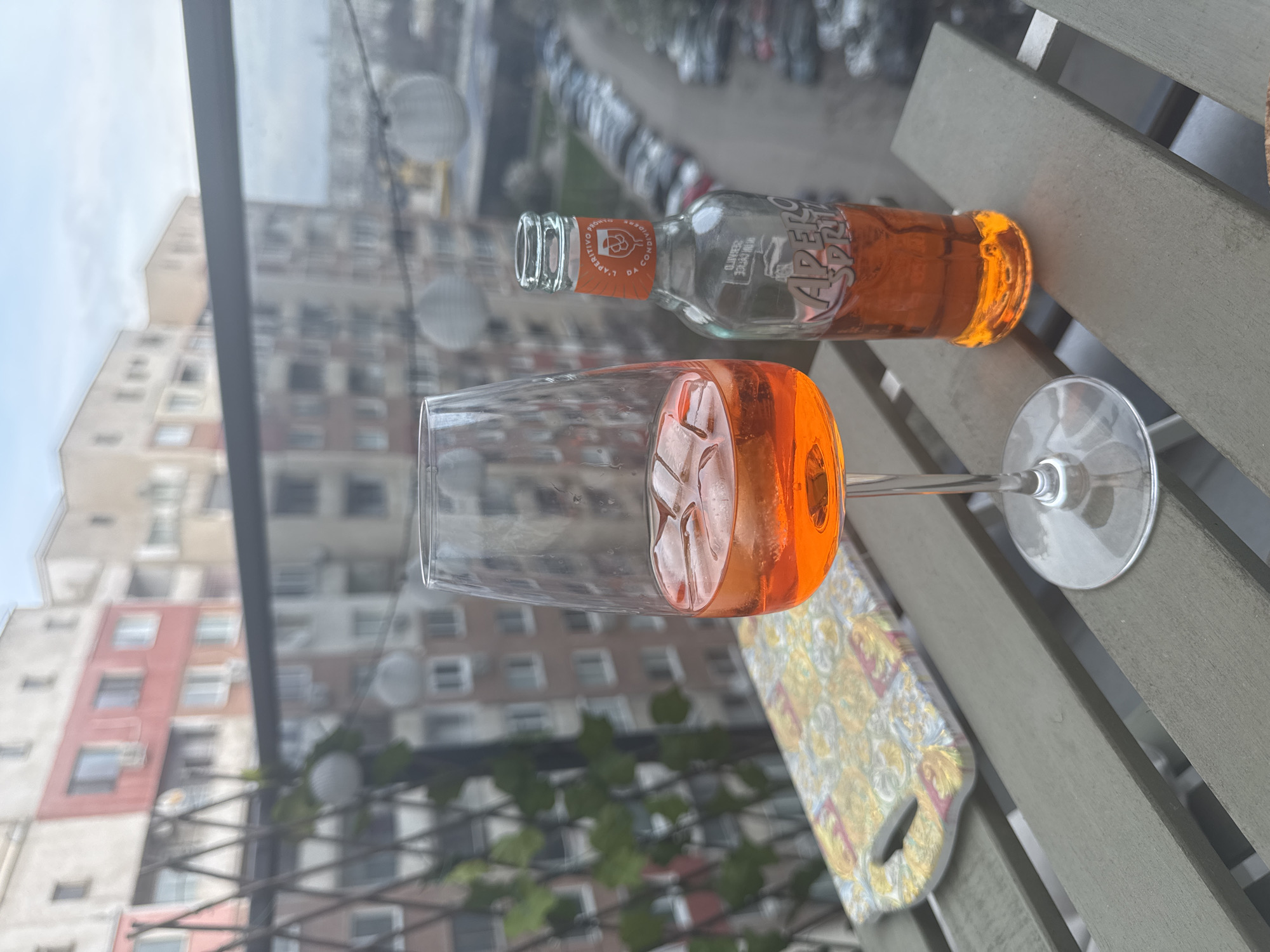 Orange beverage served in wine glass captured in Sofia