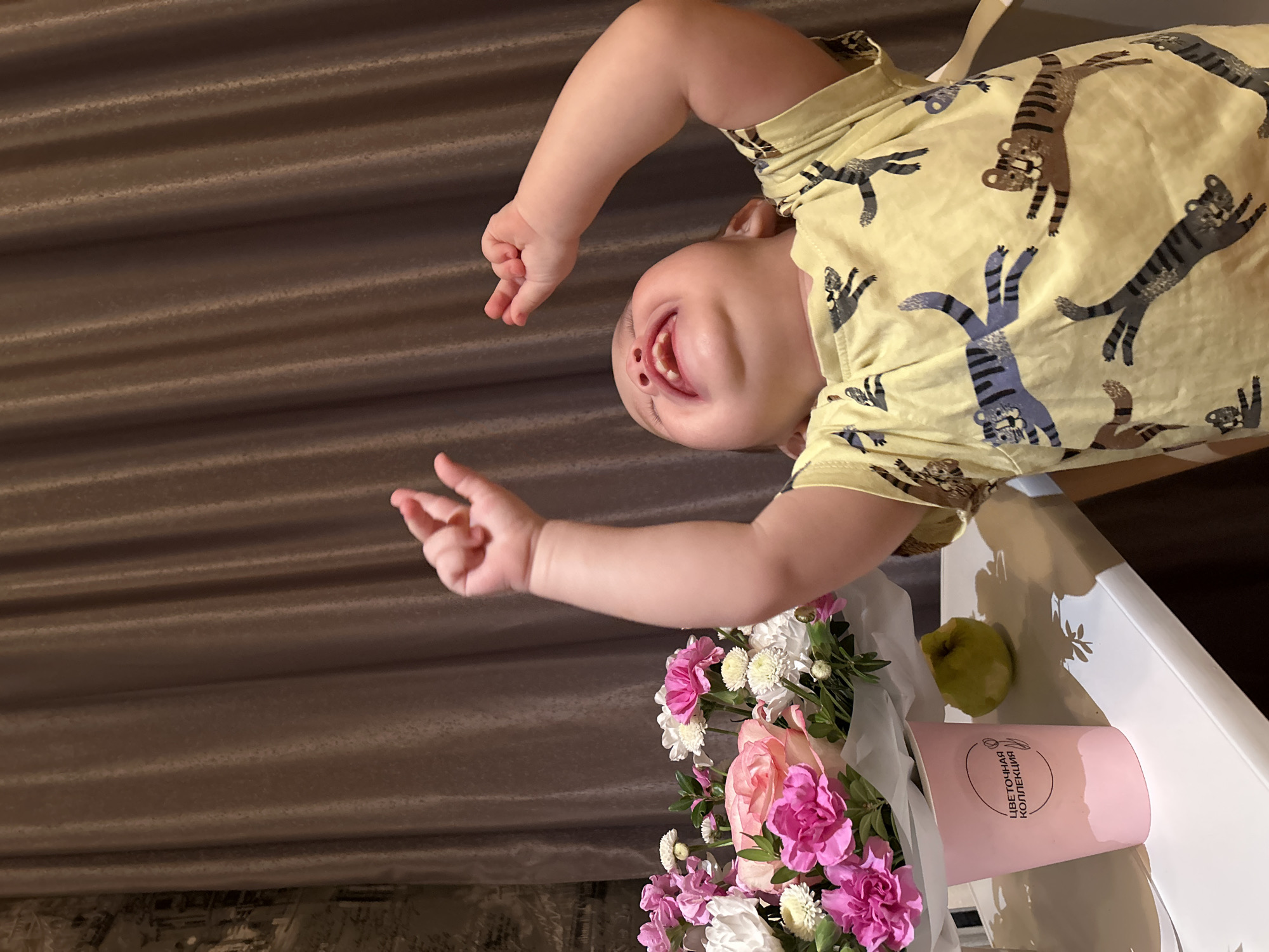 Family celebration with flowers documented in Chaikovsky, Russia