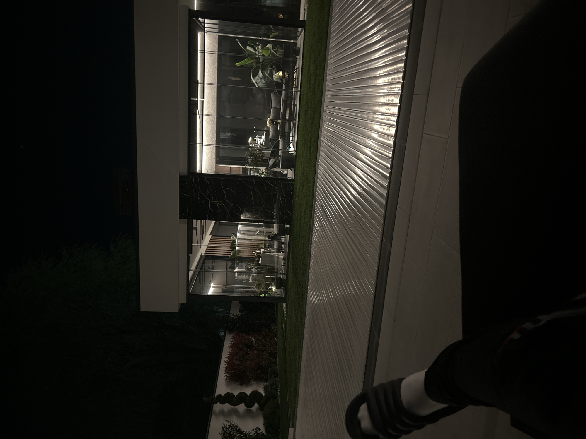 Modern glass building observed at night in Plovdiv