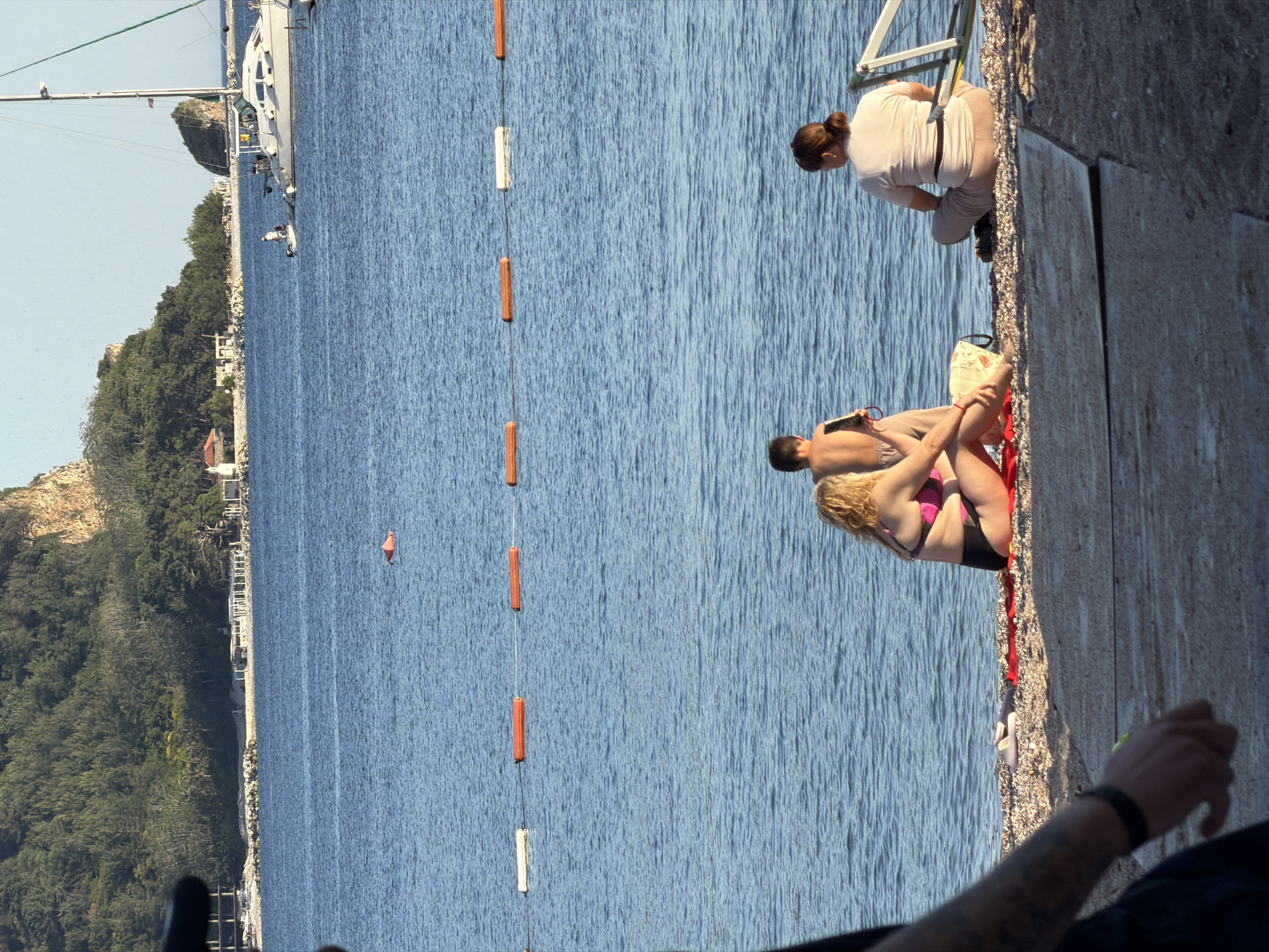 Summer afternoon beach activities observed in Budva, Montenegro