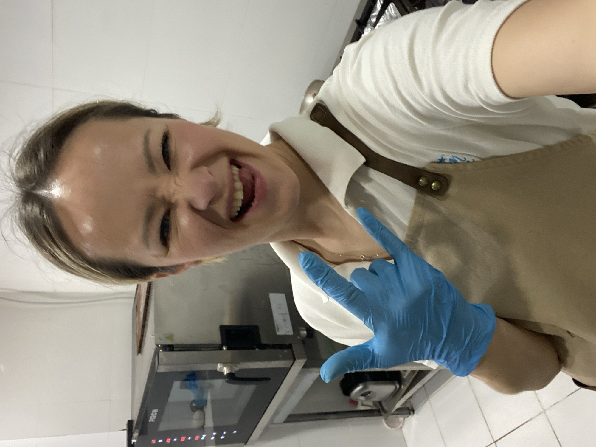 Woman captures joyful kitchen selfie in Montenegro