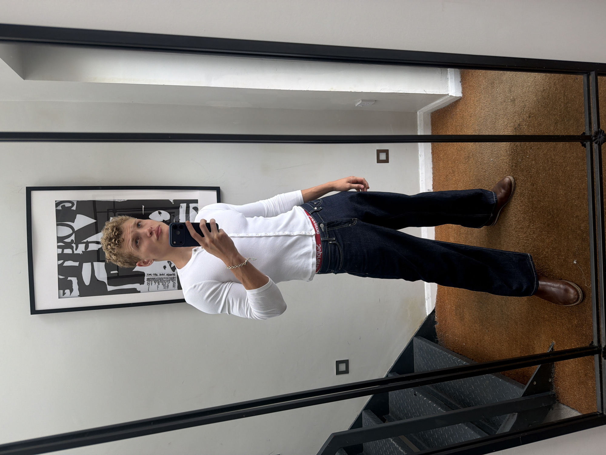 Mirror selfie in a white button-front shirt, London