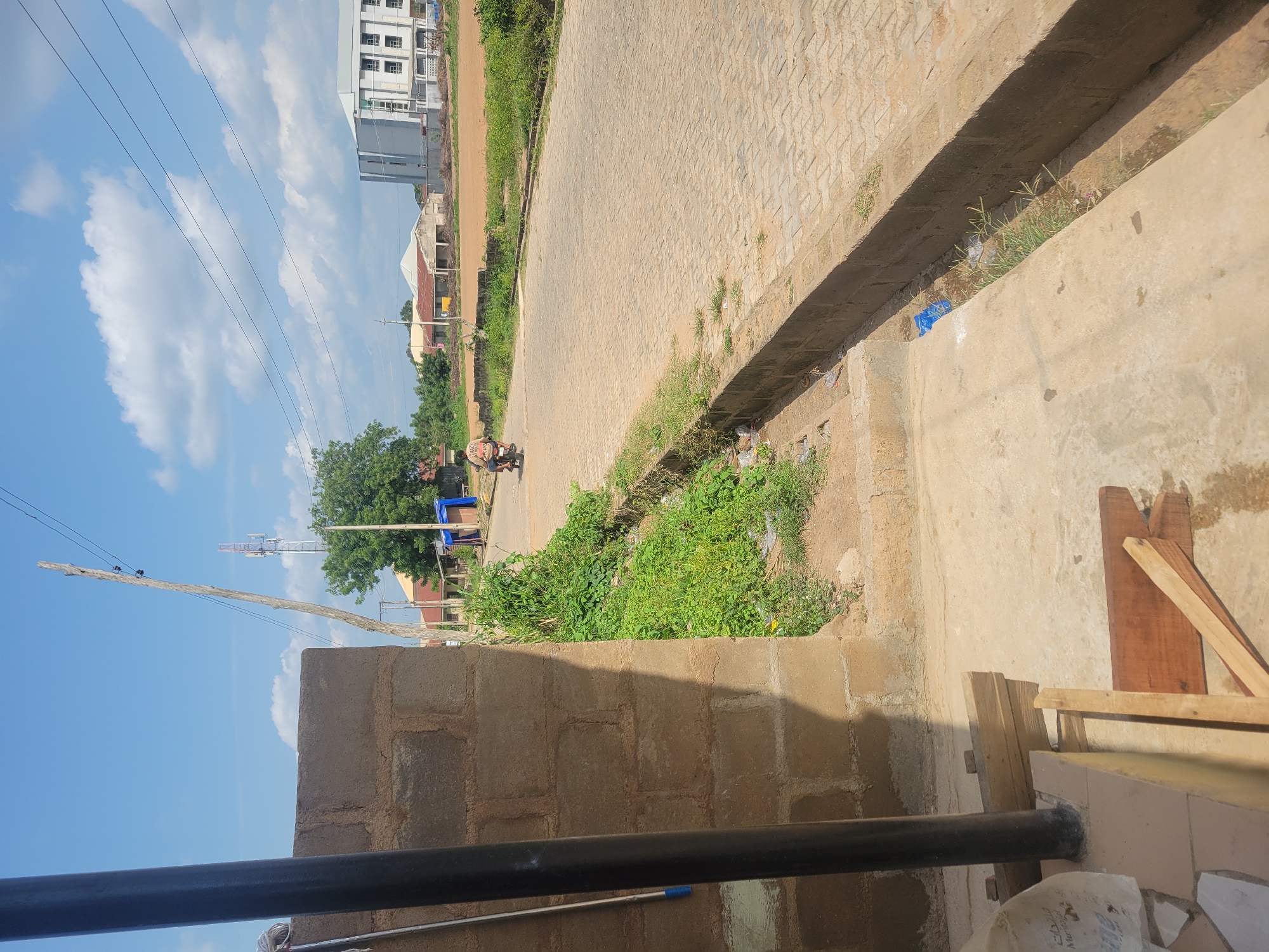 Street and building scenes from a sunny afternoon in Ogbomosho