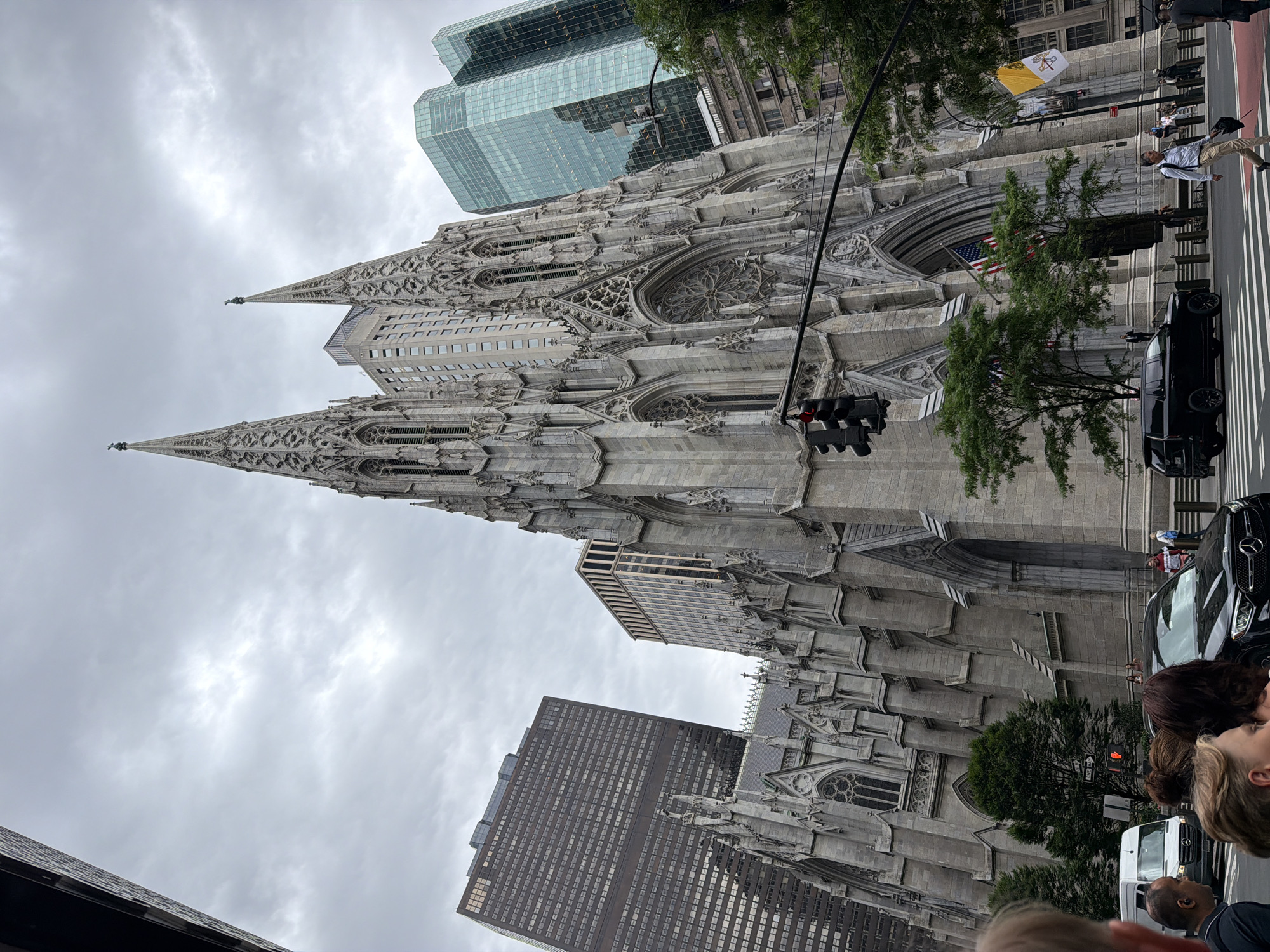 Midtown Manhattan afternoon: Pride flags, landmarks, and retail stops