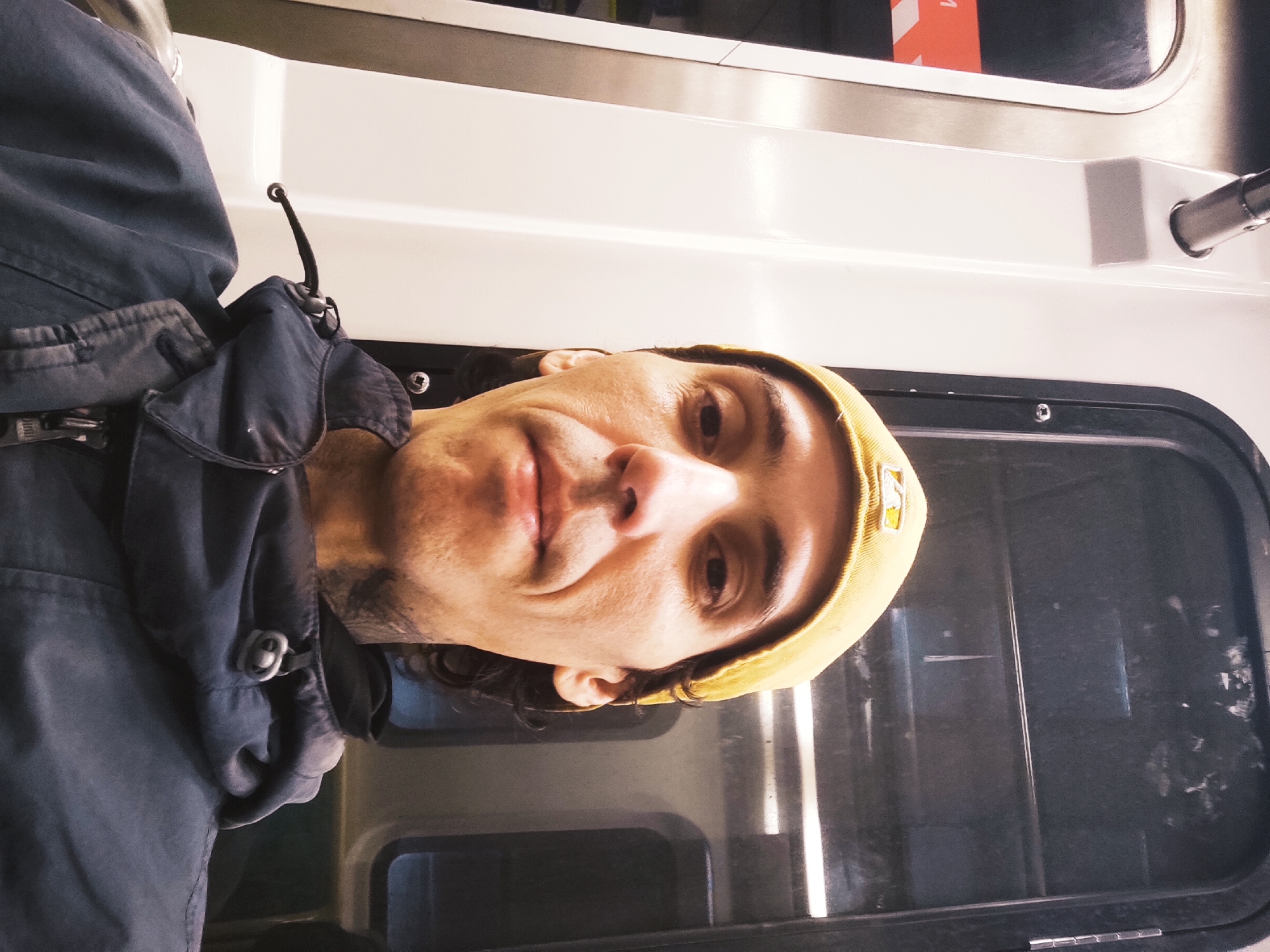 Man takes selfie on Buenos Aires train