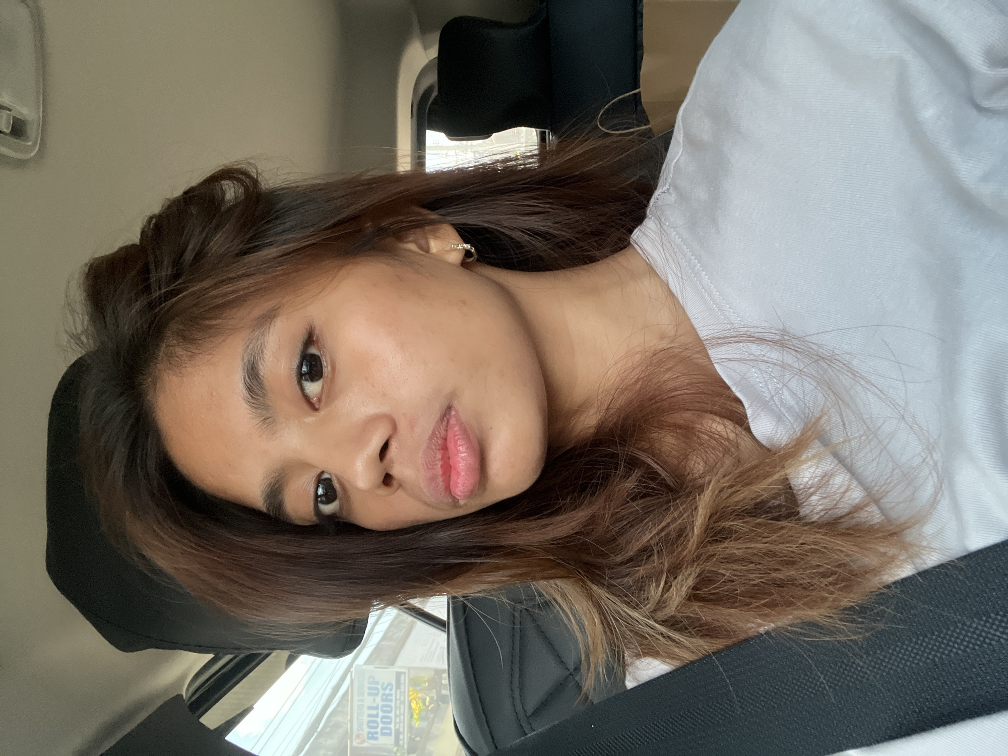 Woman takes selfies in car in Davao City