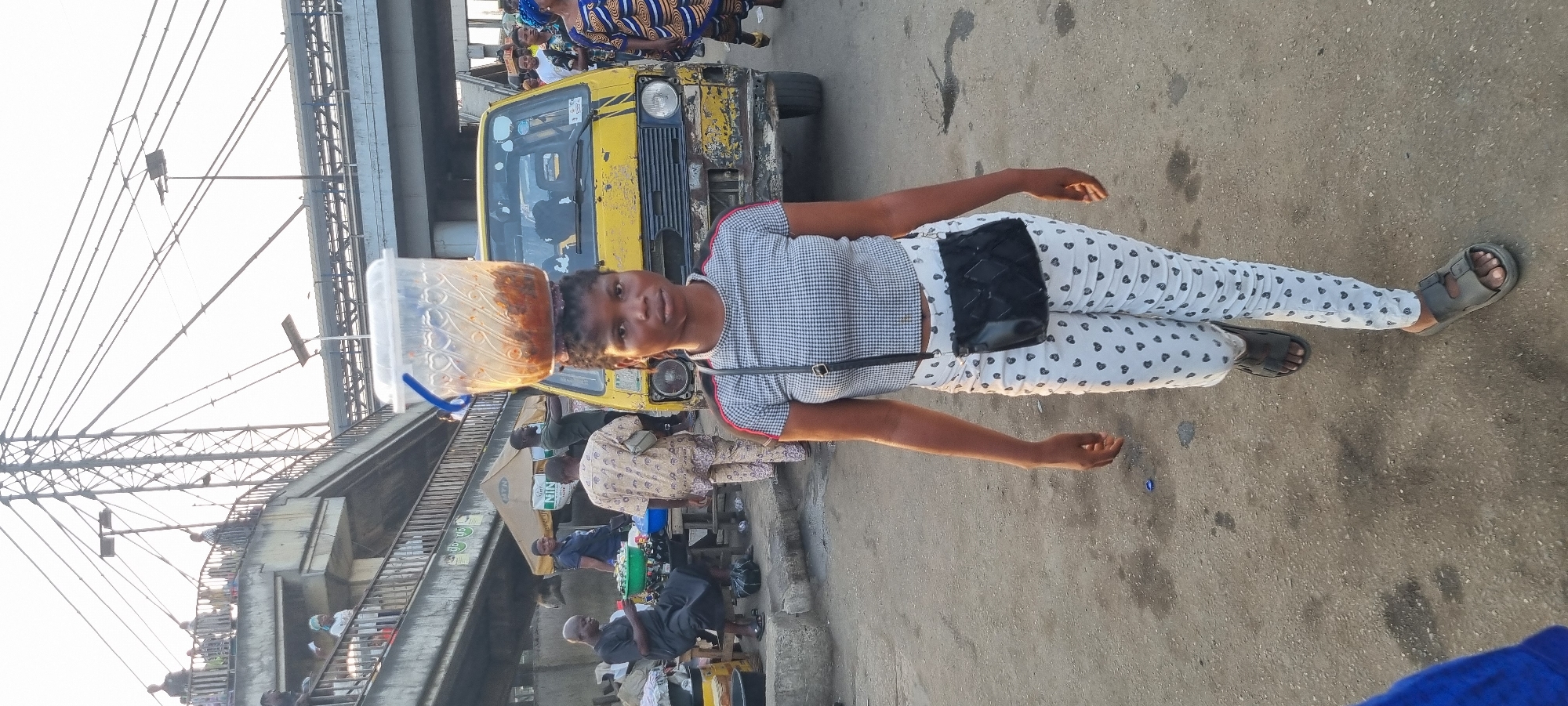 Urban life documented around Lagos transportation infrastructure
