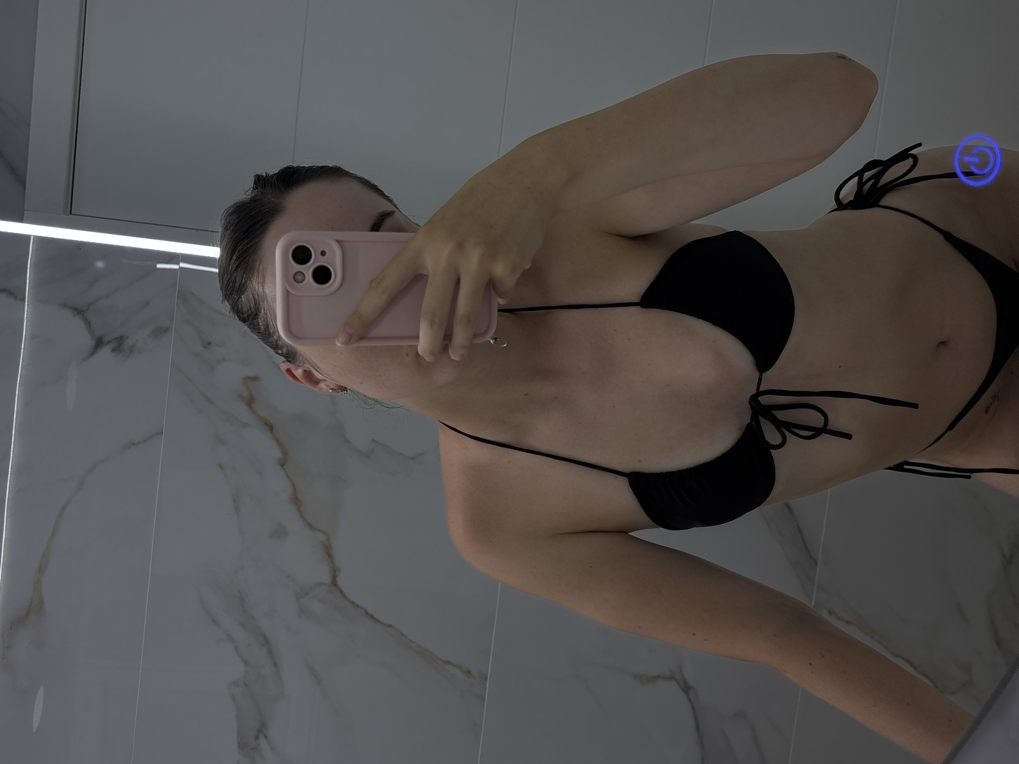 Bathroom mirror selfies in a marble-tiled space, Cabezo De Torres