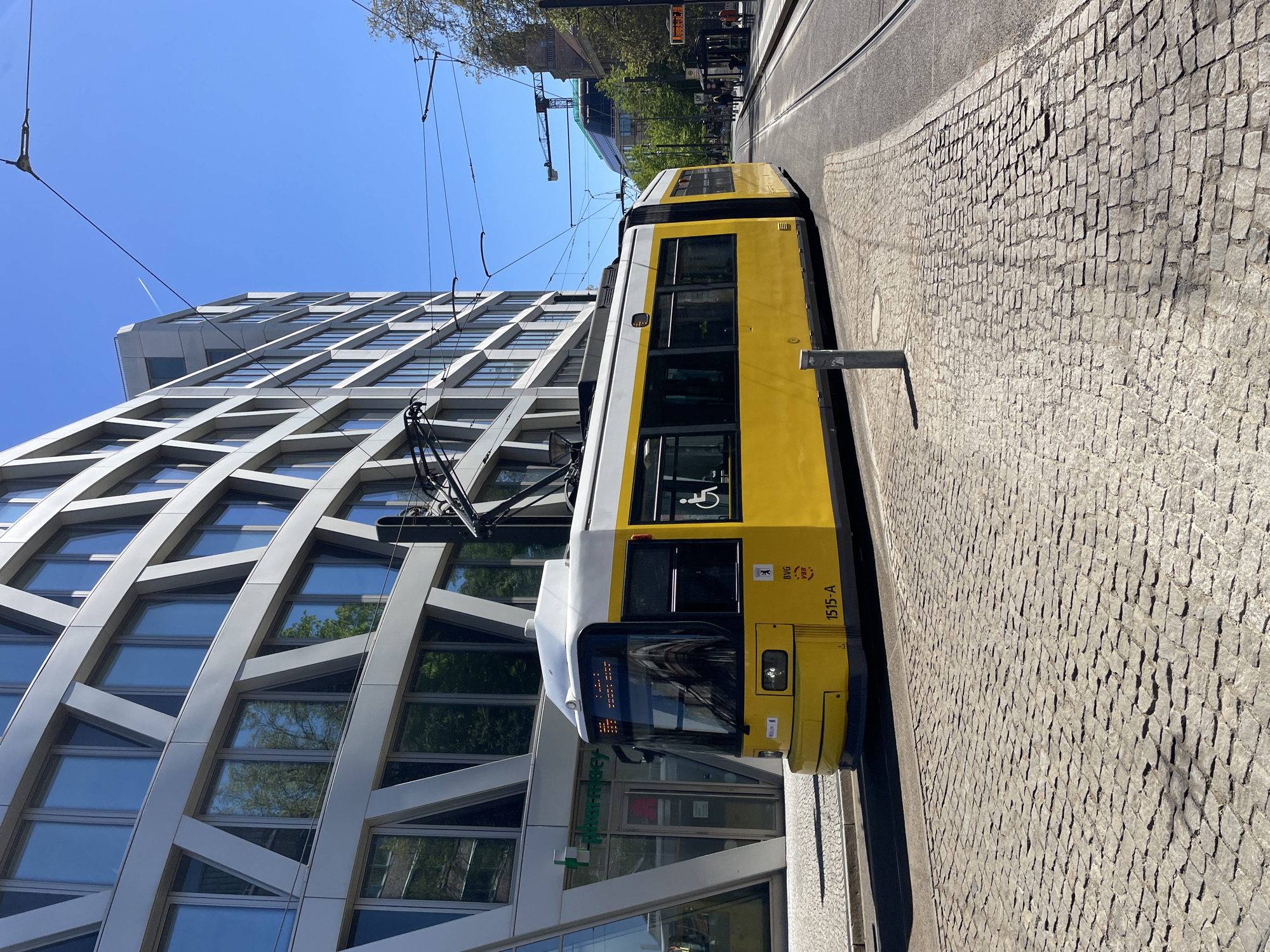 Ordinary Berlin morning: trams, river boats, street music captured