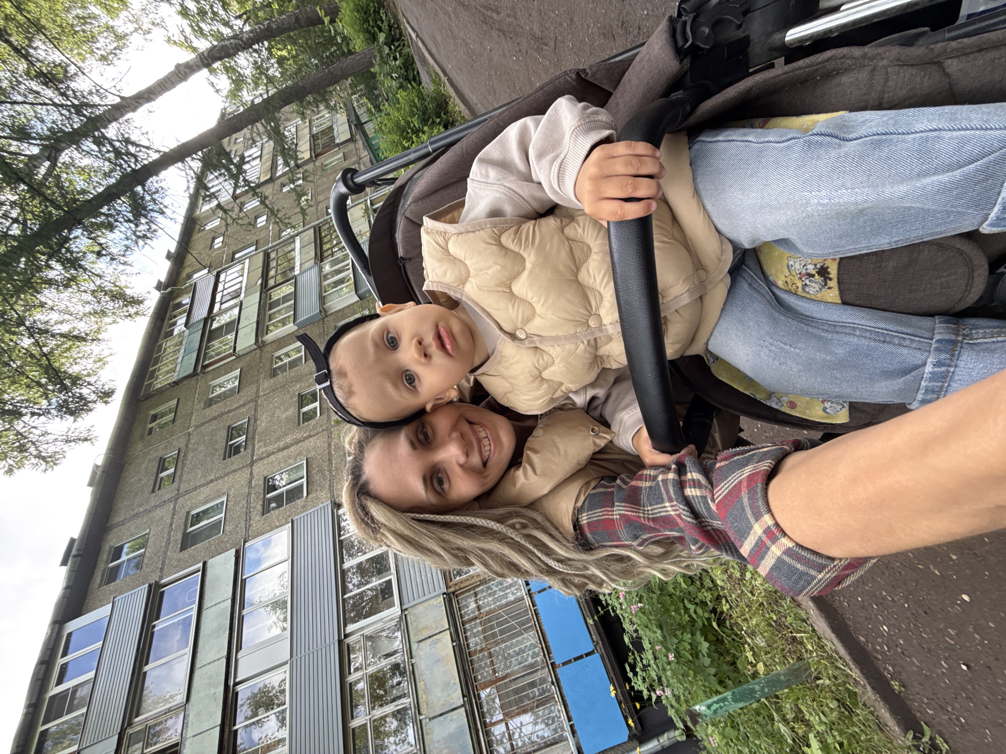 Mother and child capture selfie moment in Rusanovo