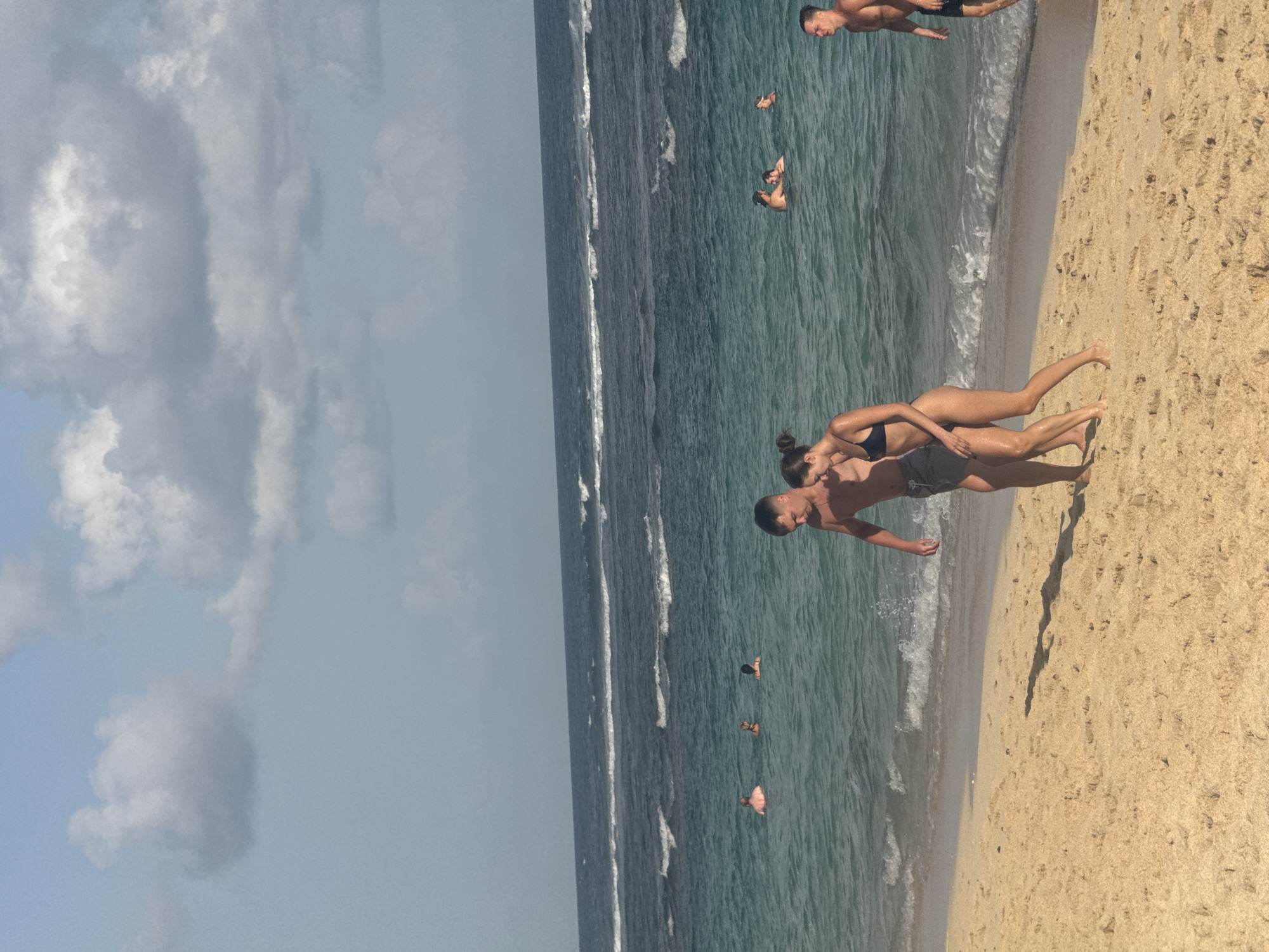 Lazy morning beach scenes along Kuta Selatan's shoreline