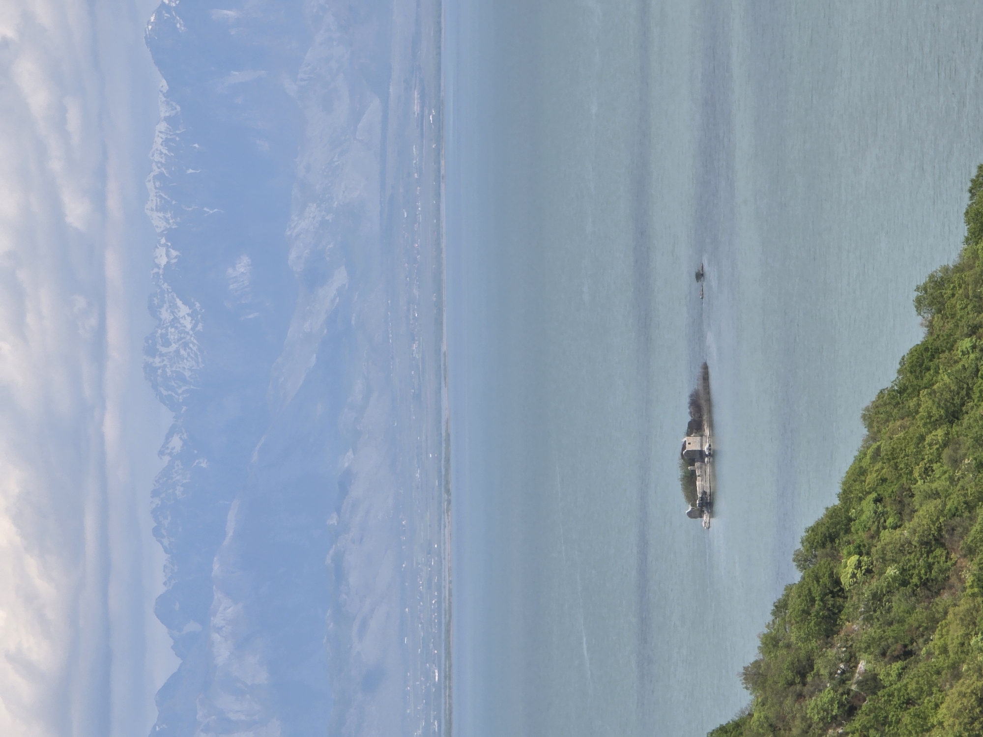 Visitor documents Skadar Lake views near Godinje, Montenegro
