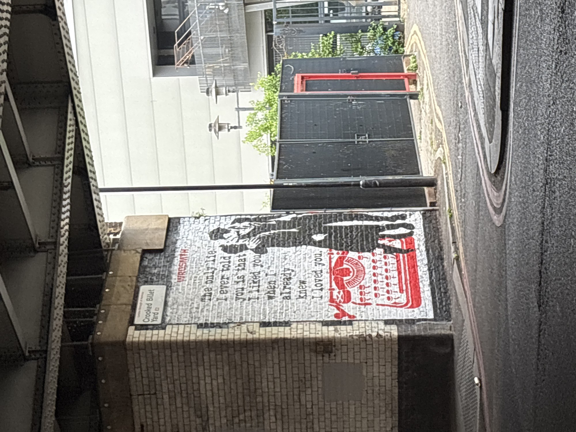London witness captures Shoreditch street scenes, peace billboard