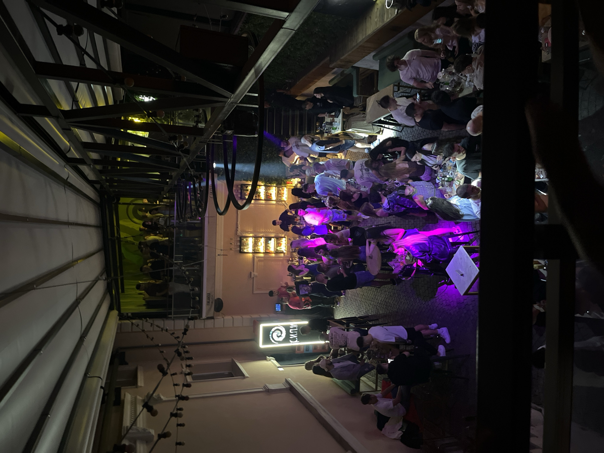 Evening nightlife scene documented at busy Plovdiv bar venue