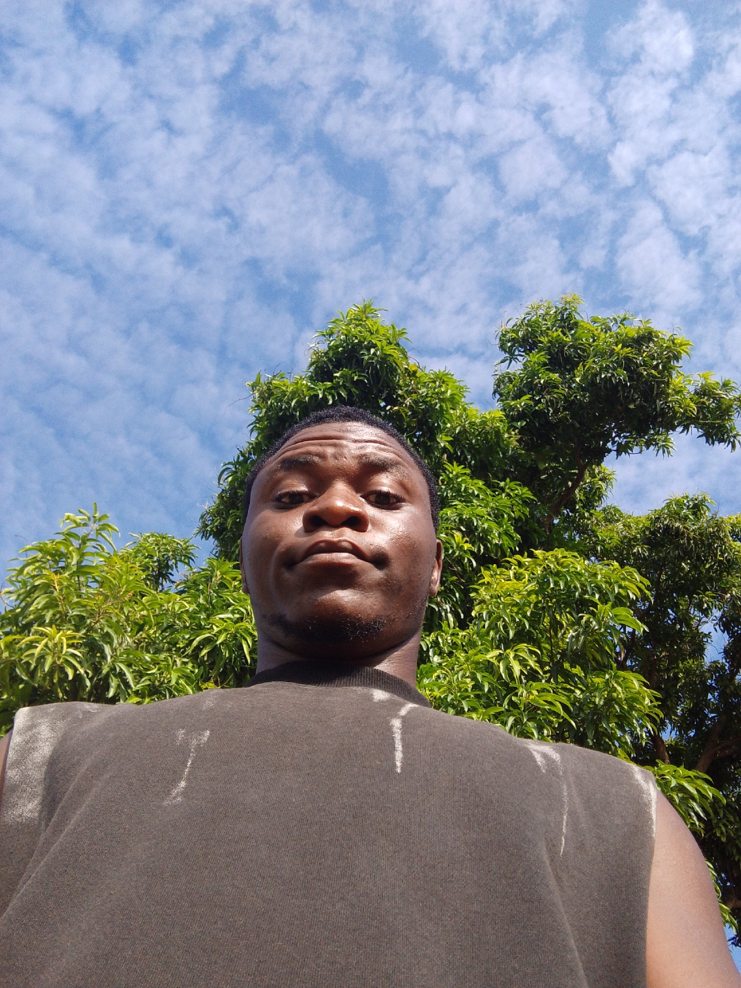 Young man documents rural Keffi landscape and construction activity