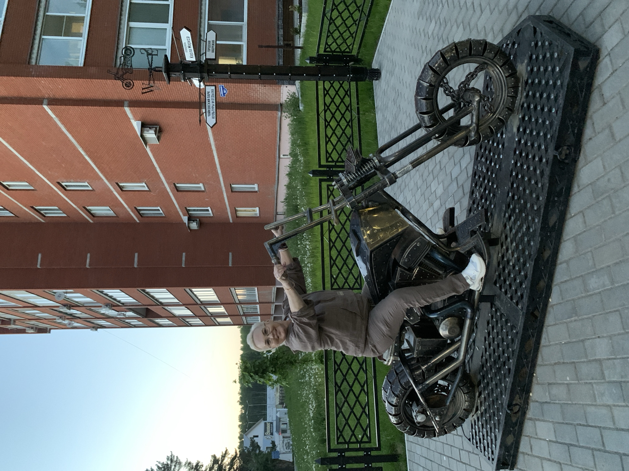 Evening photography session at motorcycle sculpture in Chaikovsky park